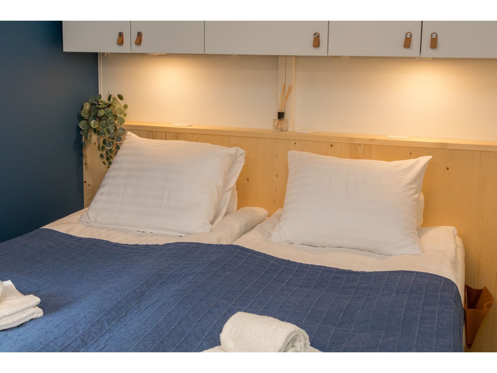 Een slaapkamer van Vakantiehuis Noordendolfer 2 huisje 49 in Zoutelande