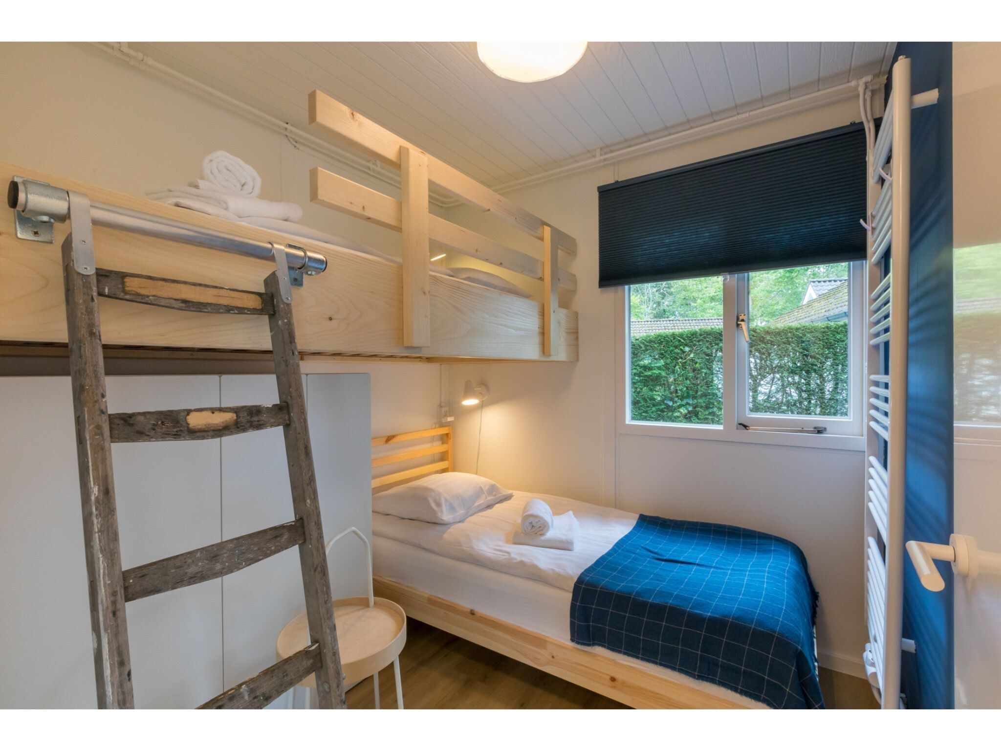 Een slaapkamer van Vakantiehuis Noordendolfer 2 huisje 49 in Zoutelande