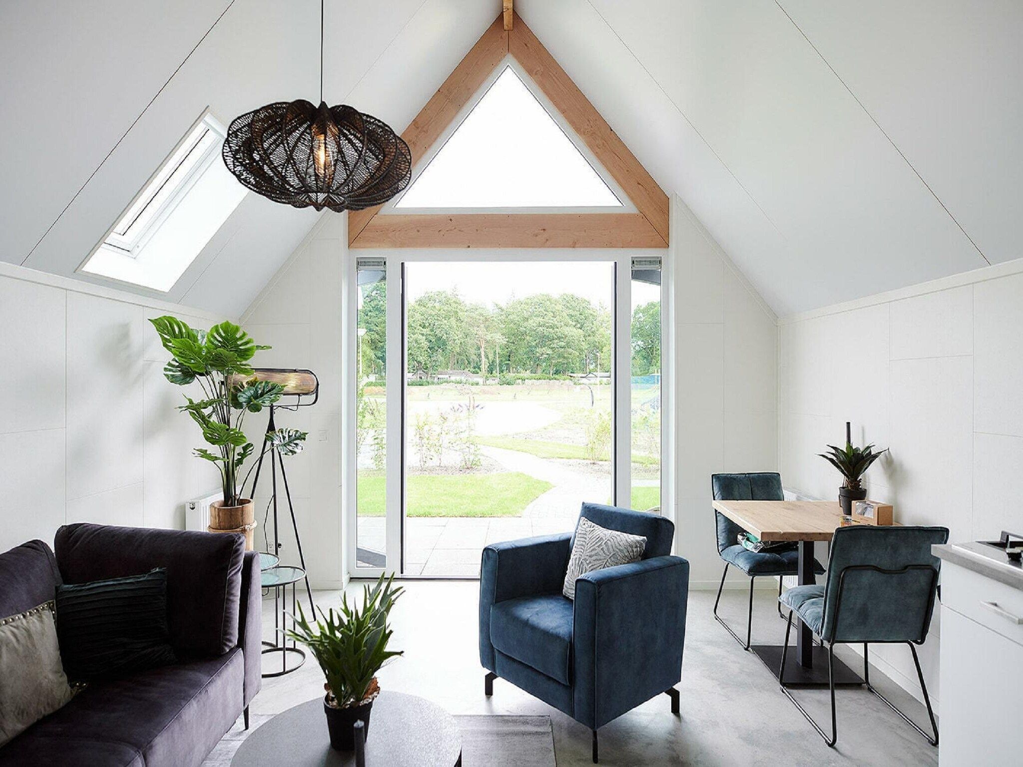 De woonkamer van Landgoed De IJsvogel 11 in Voorthuizen