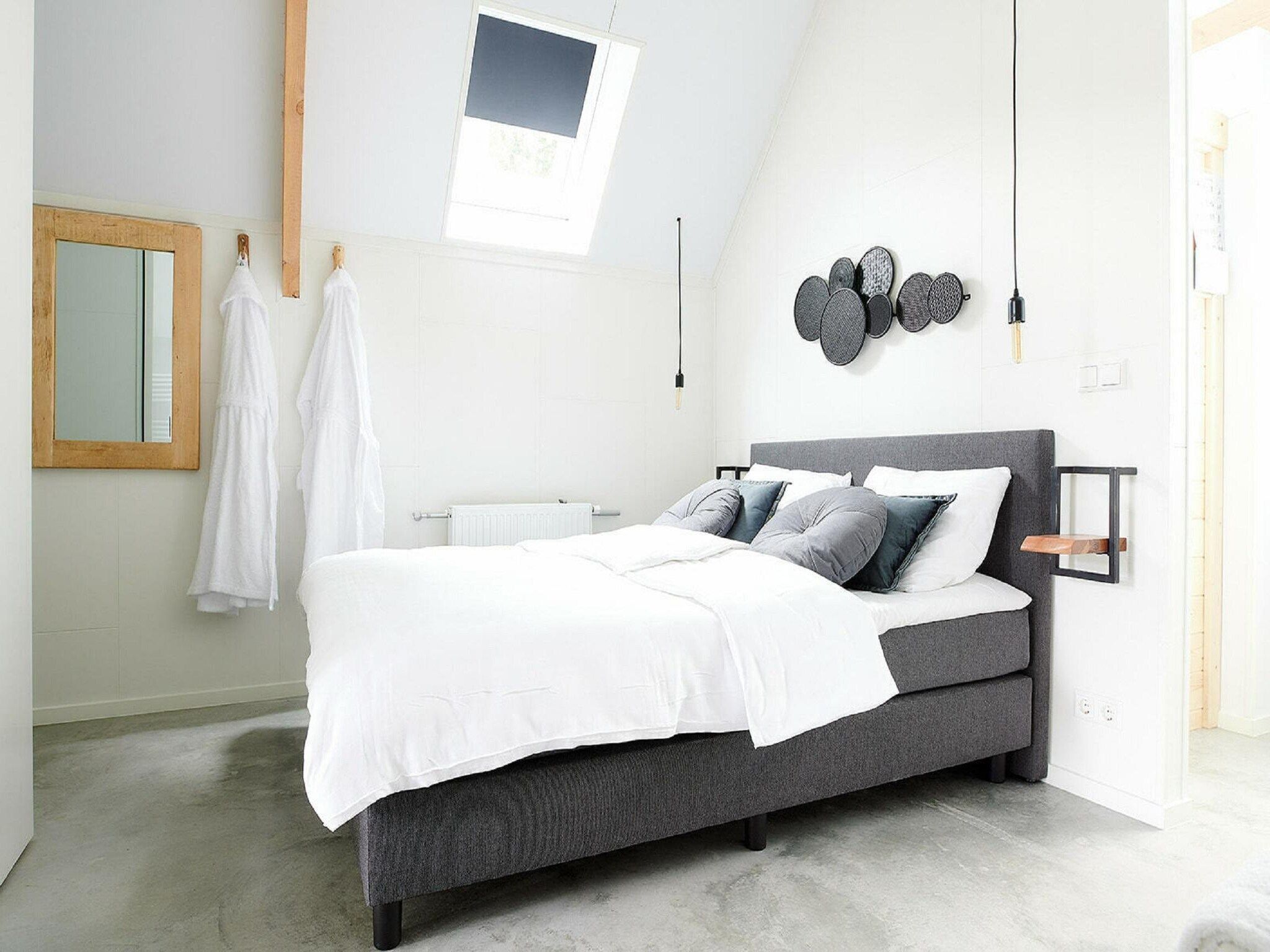 Een slaapkamer van Landgoed De IJsvogel 11 in Voorthuizen
