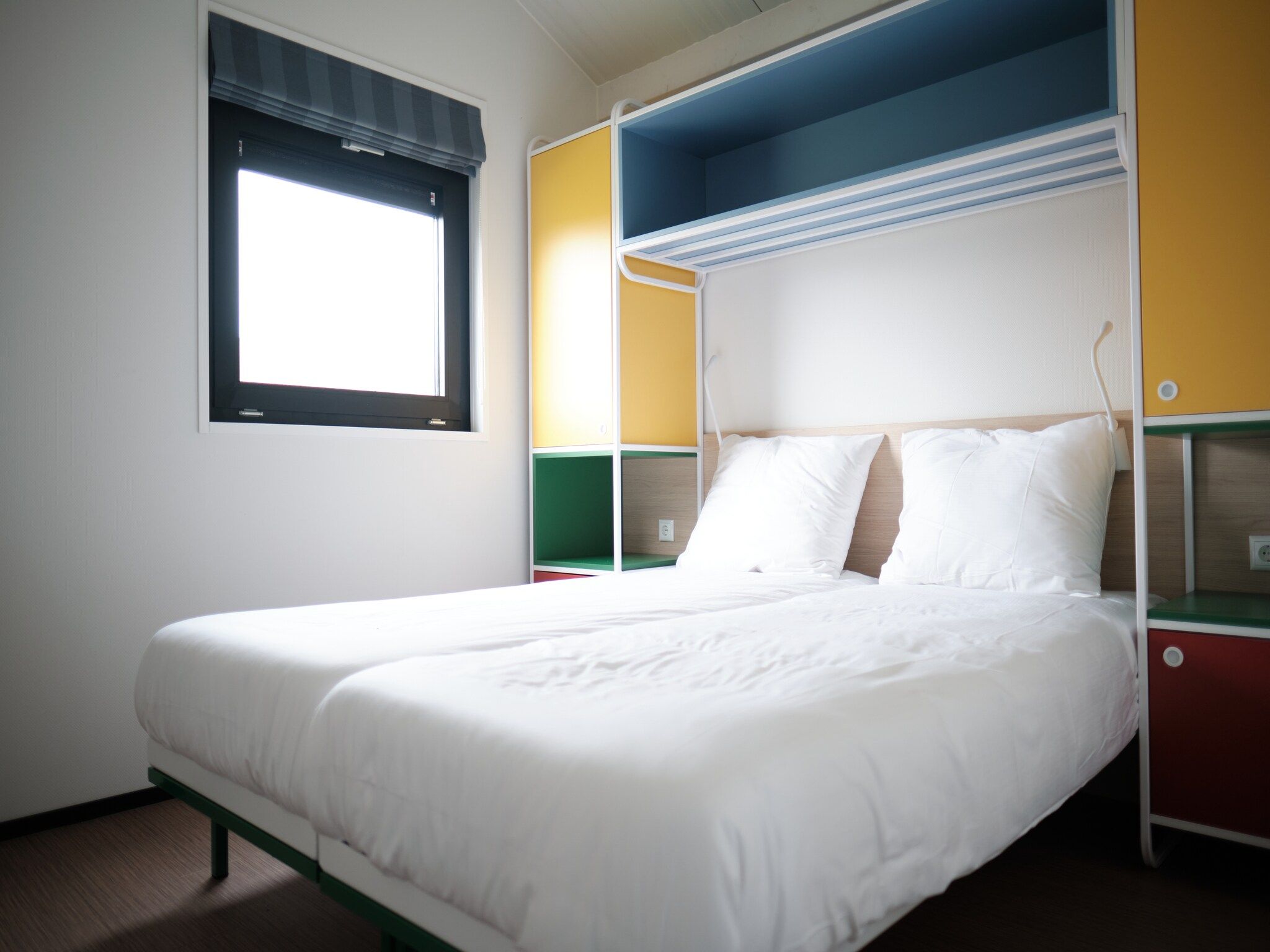 Een slaapkamer van Resort Callantsoog 1 in Callantsoog