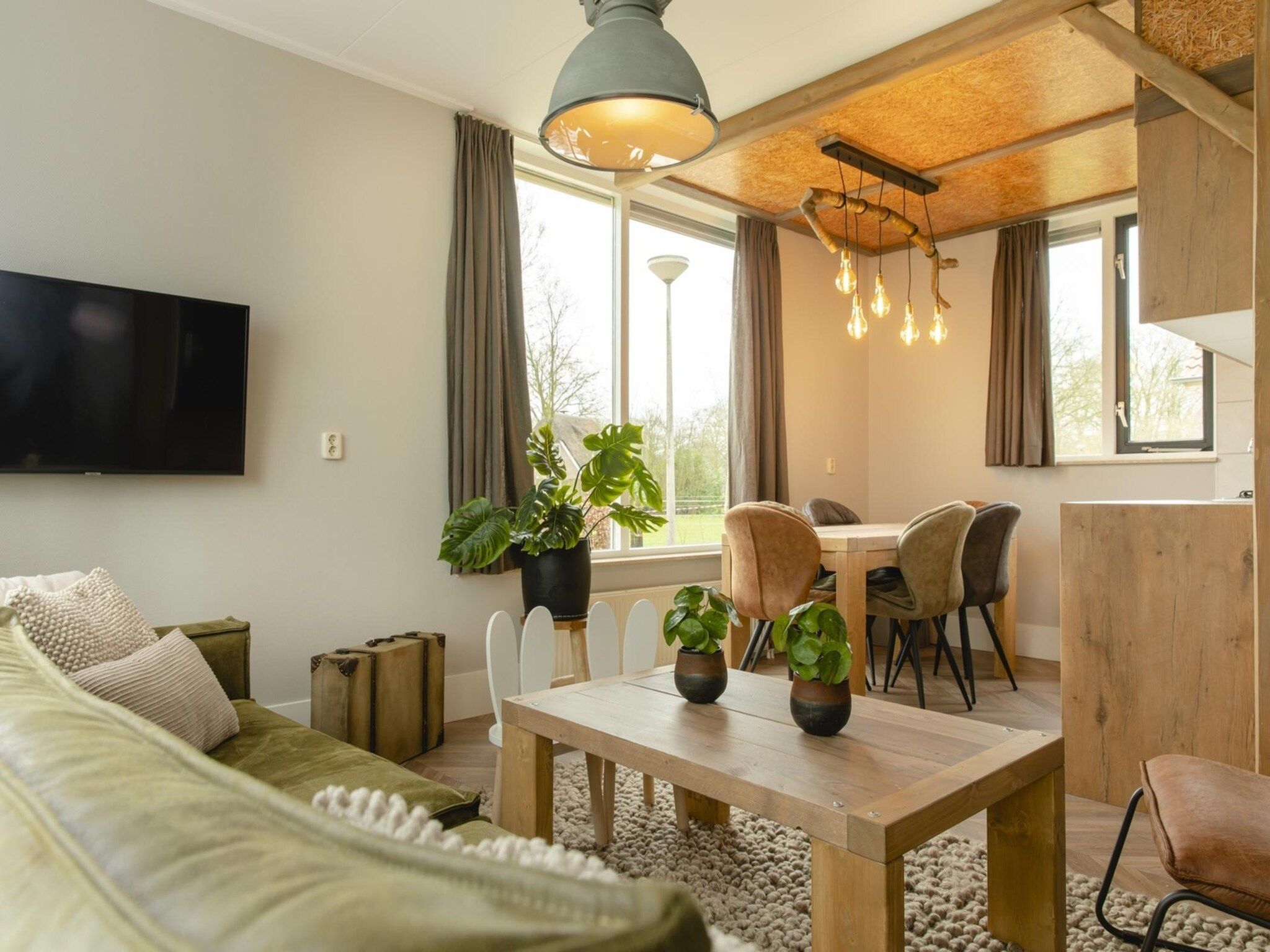 De woonkamer van Vakantiepark Mölke 18 in Zuna