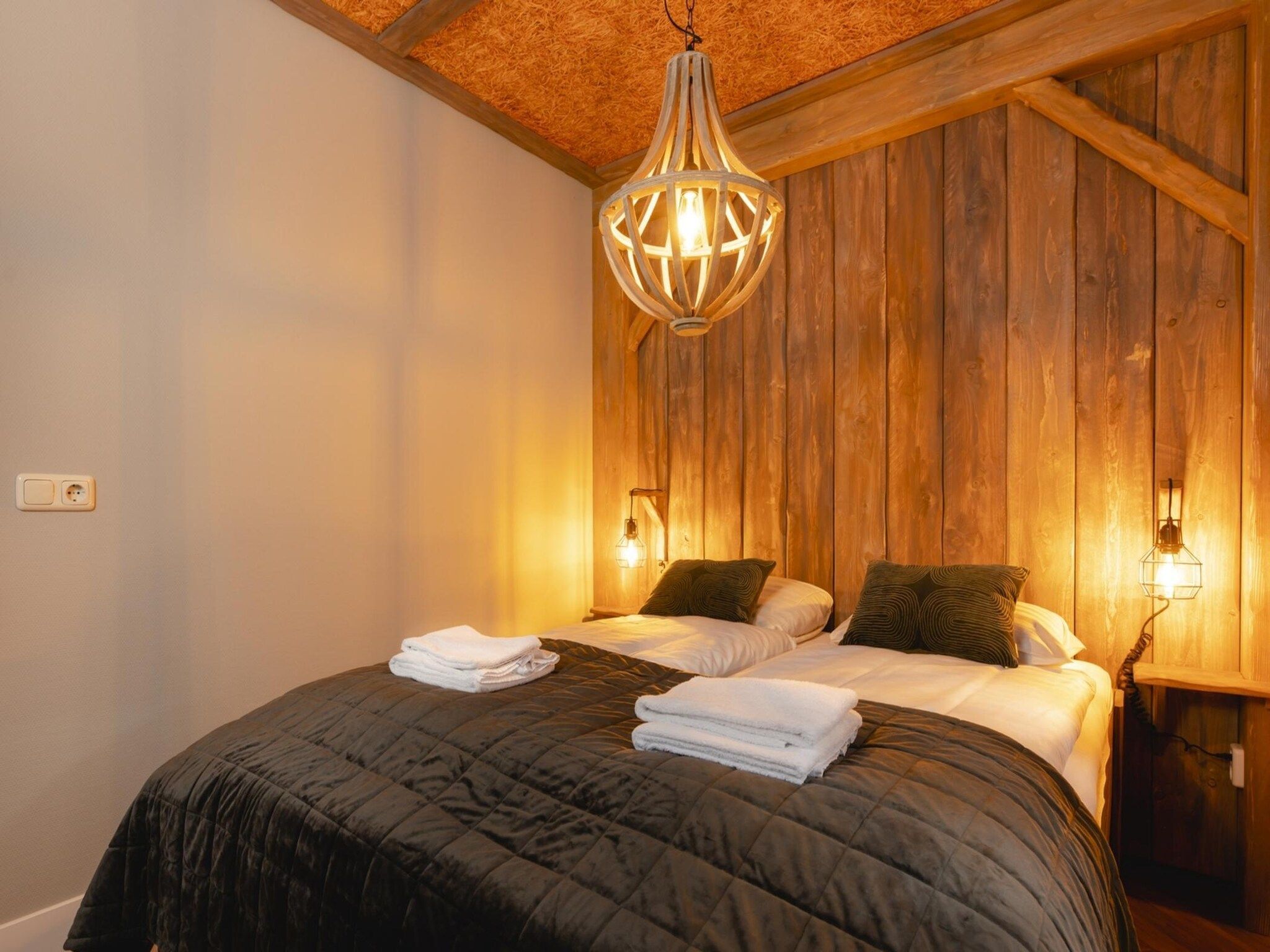 Een slaapkamer van Vakantiepark Mölke 18 in Zuna