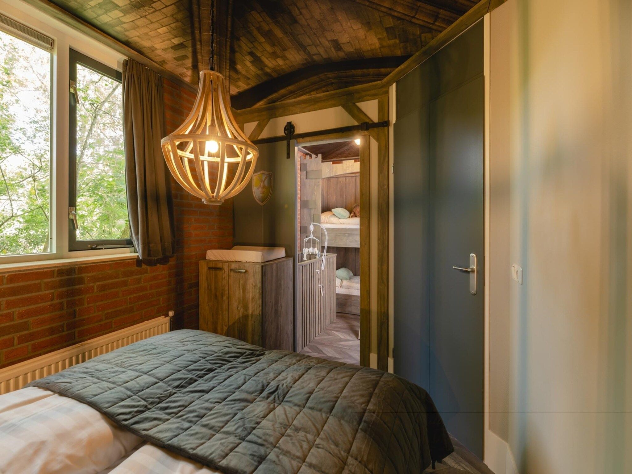 Een slaapkamer van Vakantiepark Mölke 18 in Zuna