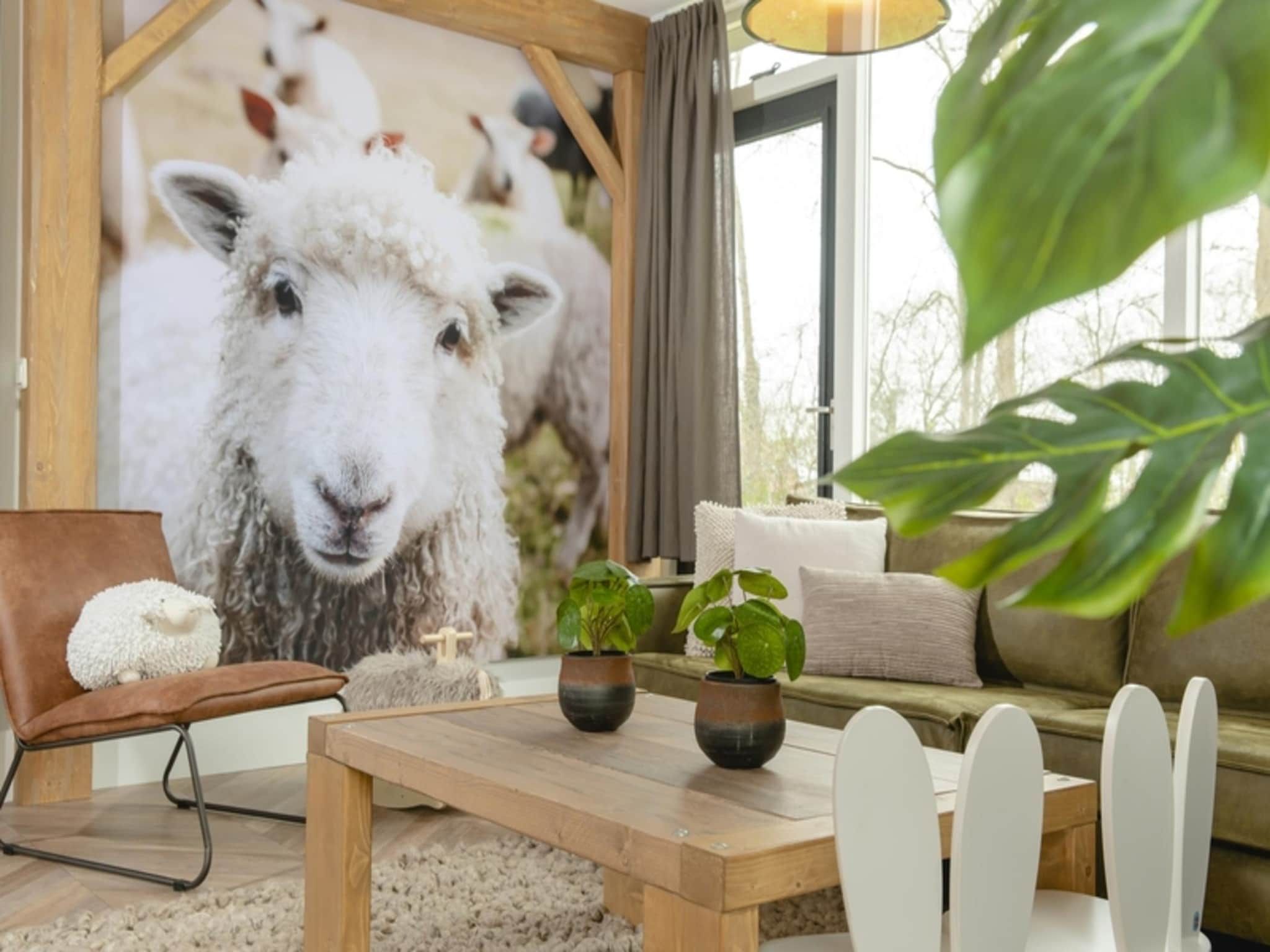 De woonkamer van Vakantiepark Mölke 18 in Zuna