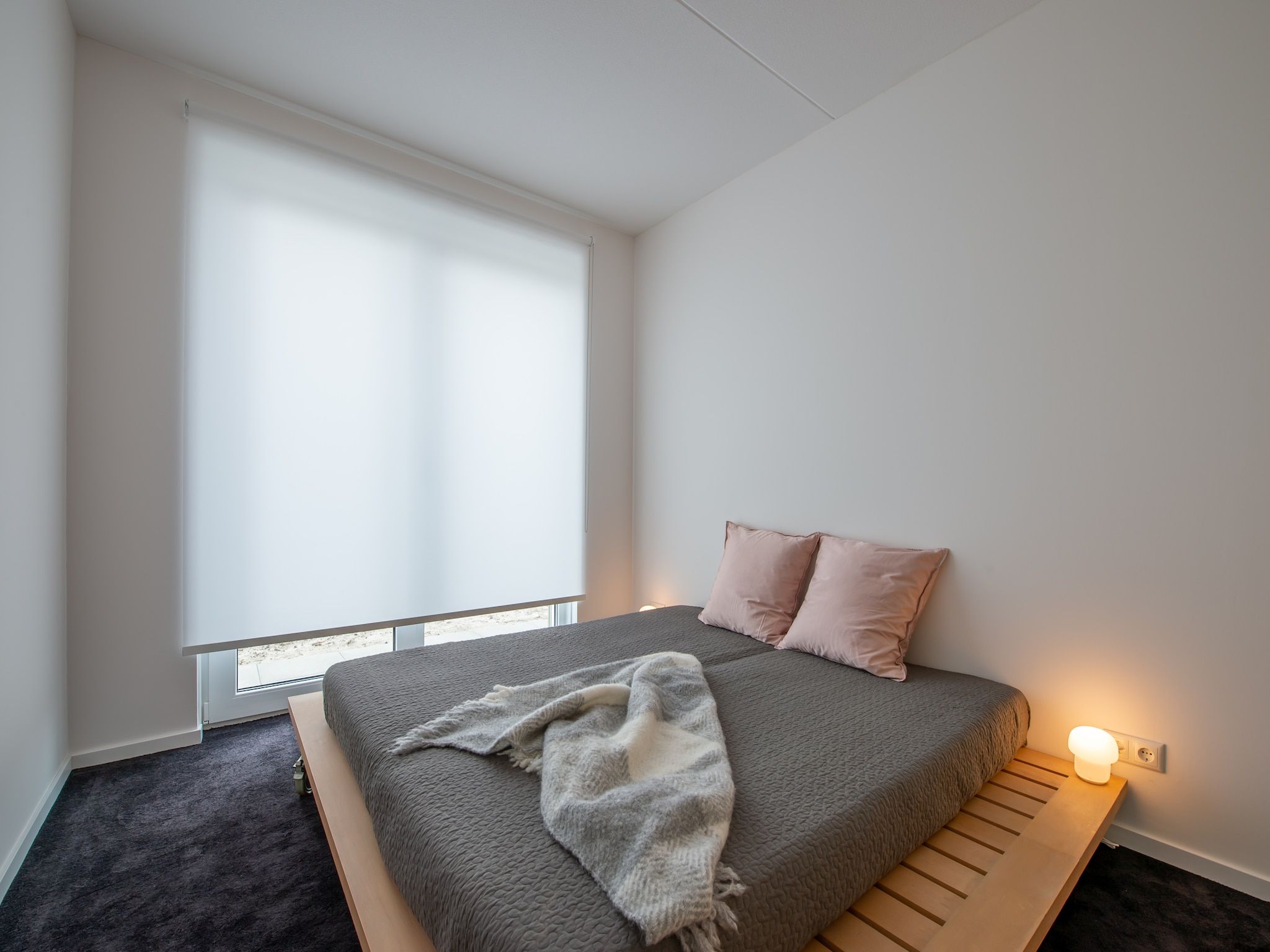Een slaapkamer van Schotsmanweg 16 in Kamperland