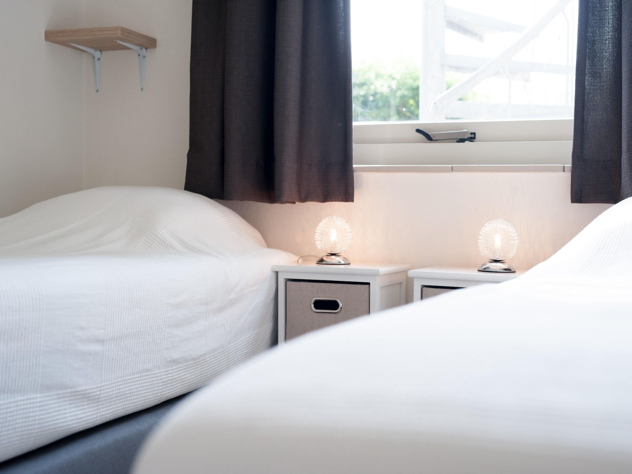 Een slaapkamer van Ostrea 34 in Kamperland