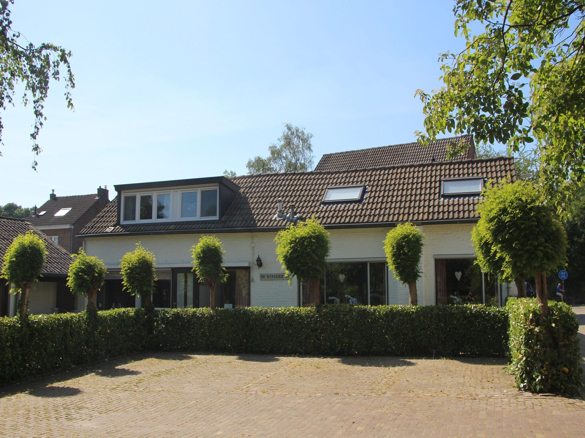 De buitenkant van De Wingerd 10P in Ulestraten