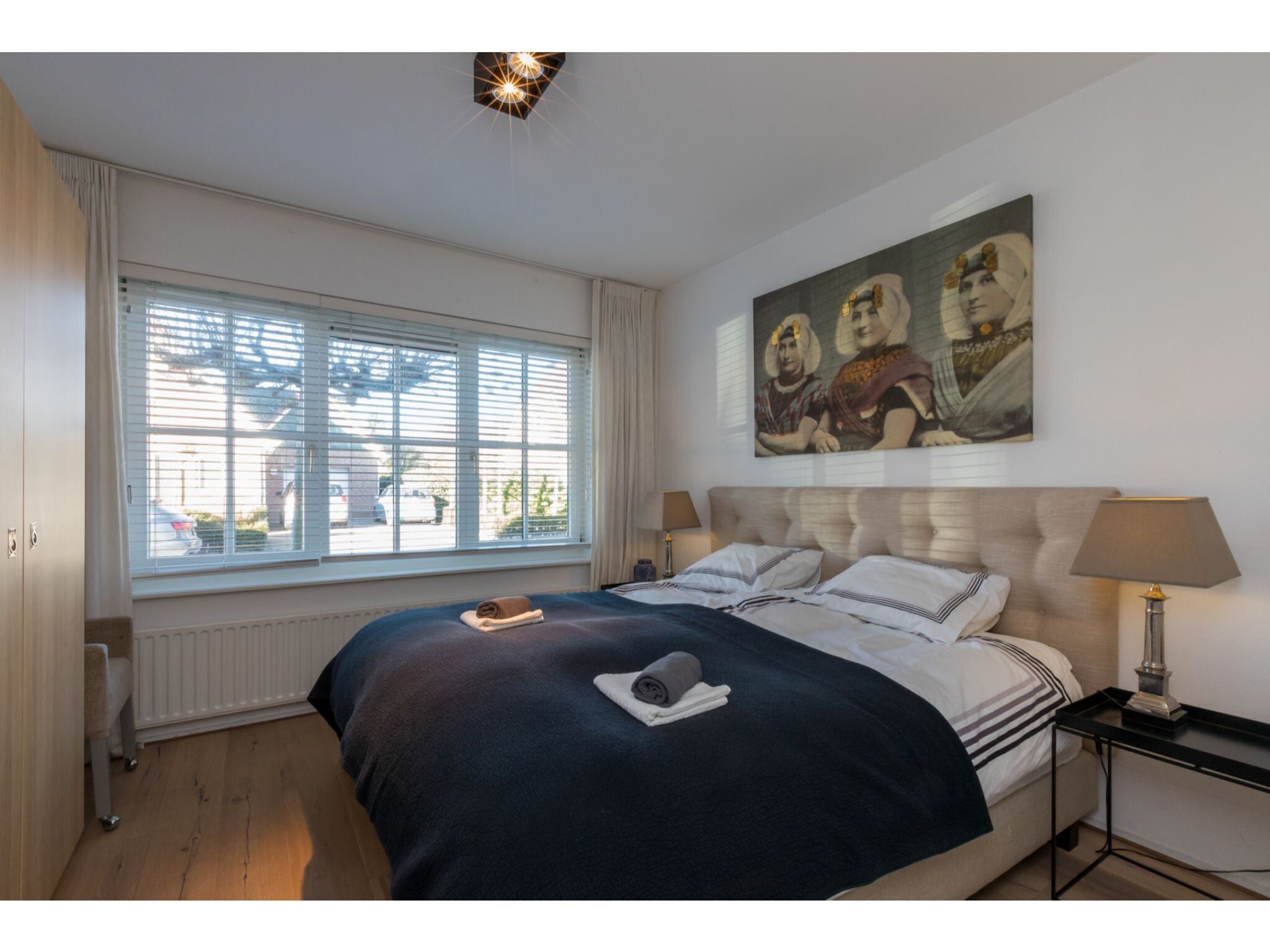 Een slaapkamer van Appartement - Borné  Zoutelande in Zoutelande