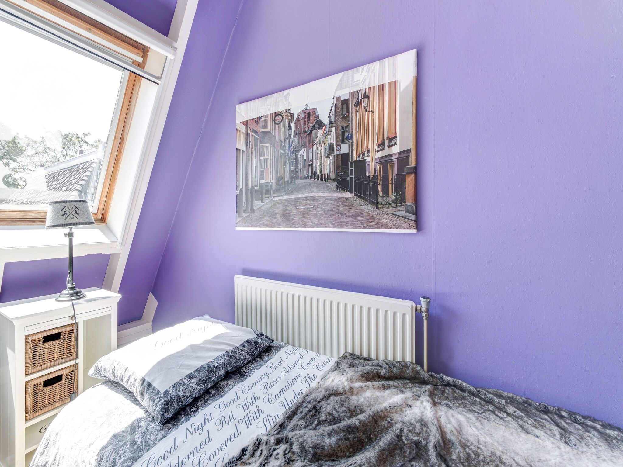 Een slaapkamer van Ruim appartement in centrum Leeuwarden in Leeuwarden