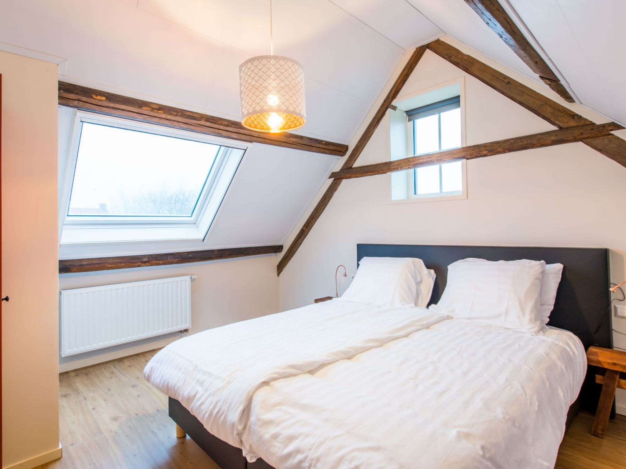 Een slaapkamer van Zoutelandseweg 2 Biggekerke in Biggekerke