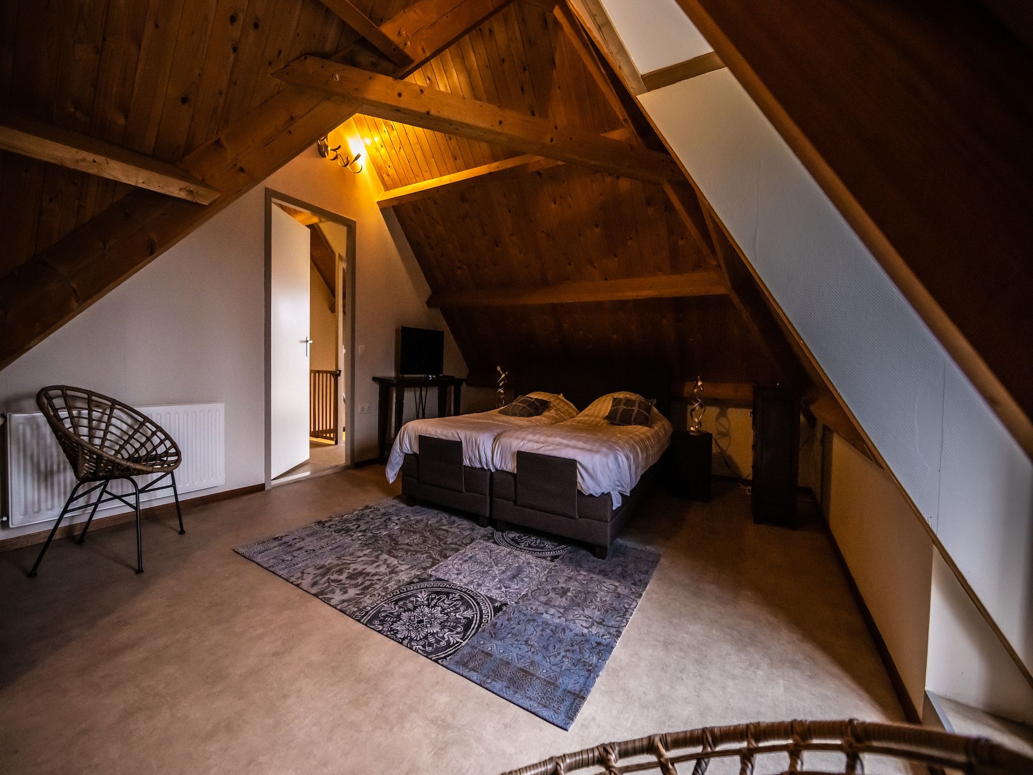 Een slaapkamer van Vakantiewoning - Oranjezon 4p in Vrouwenpolder