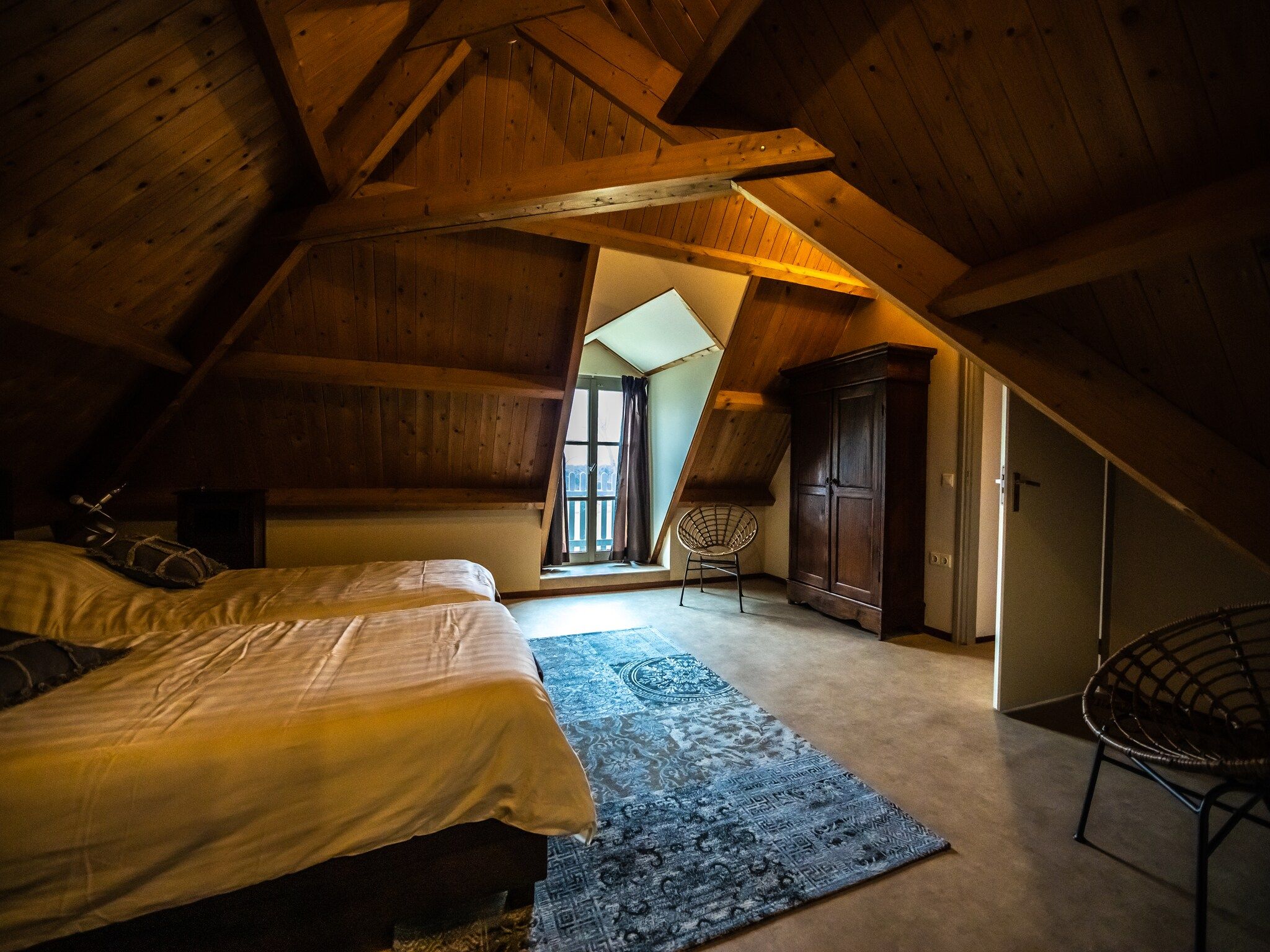Een slaapkamer van Vakantiewoning - Oranjezon 4p in Vrouwenpolder
