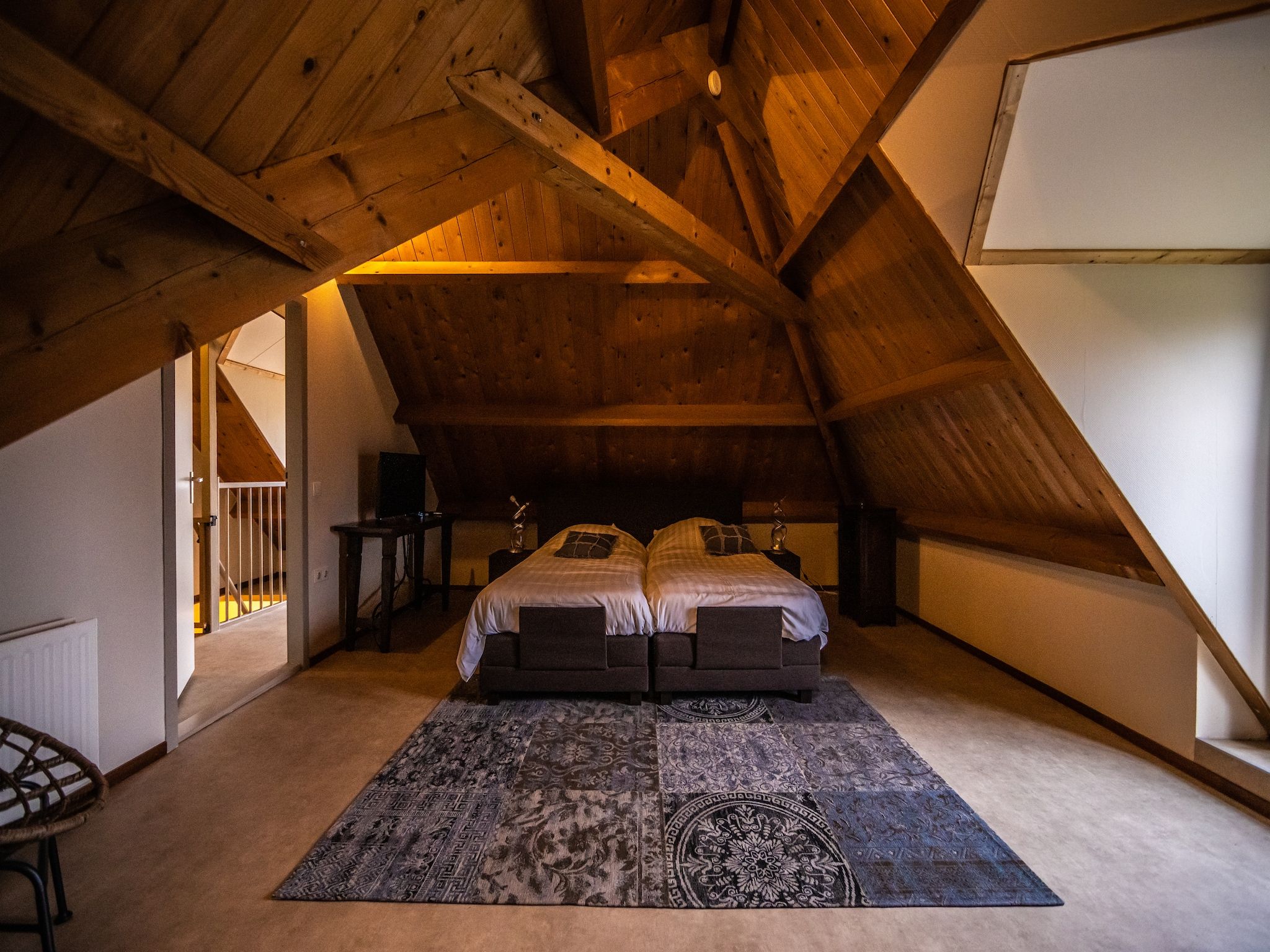 Een slaapkamer van Vakantiewoning - Oranjezon 4p in Vrouwenpolder