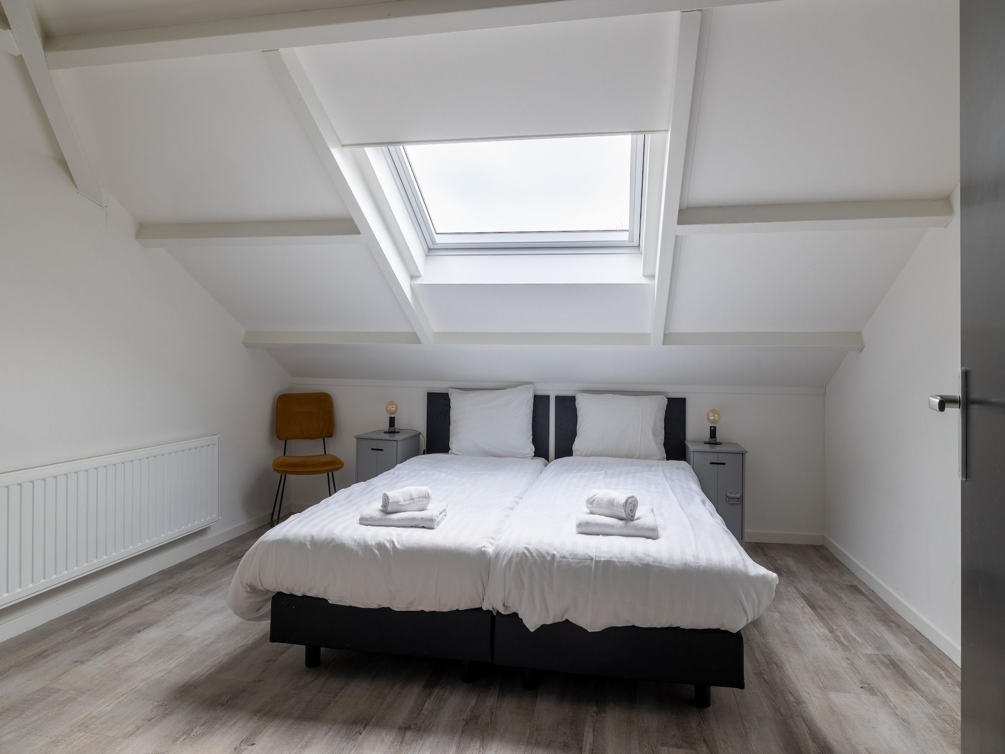 Een slaapkamer van Oranjezon app 4p in Vrouwenpolder