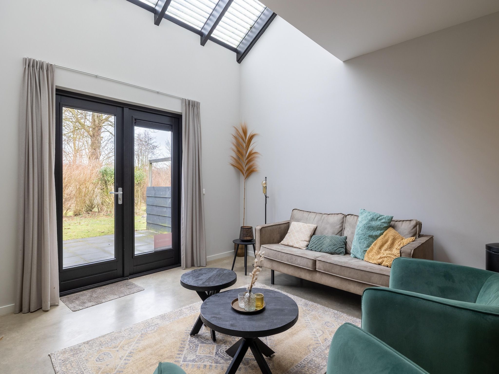 De woonkamer van Oranjezon app 4p in Vrouwenpolder