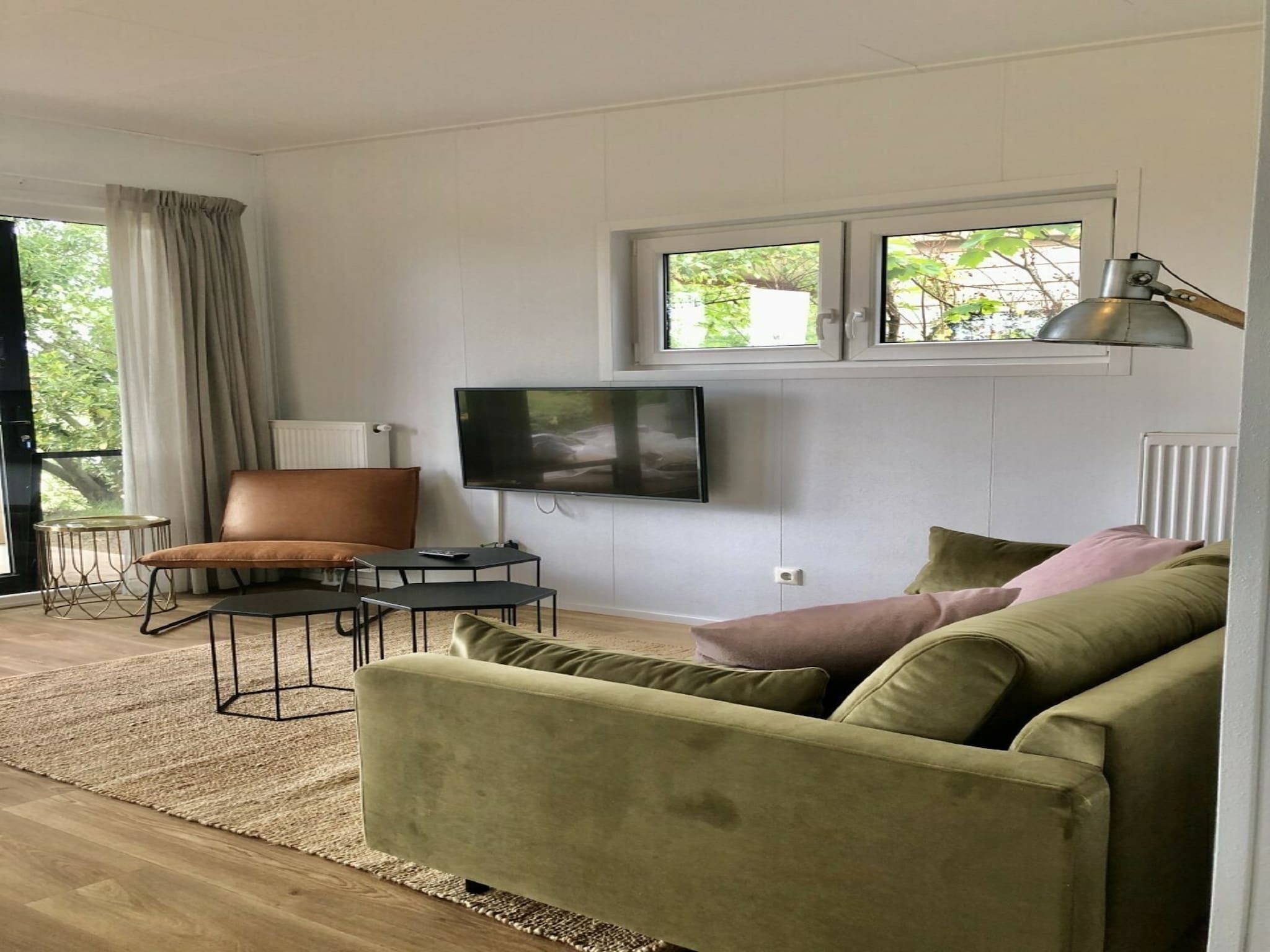 De woonkamer van Vakantiepark Mölke 28 in Zuna