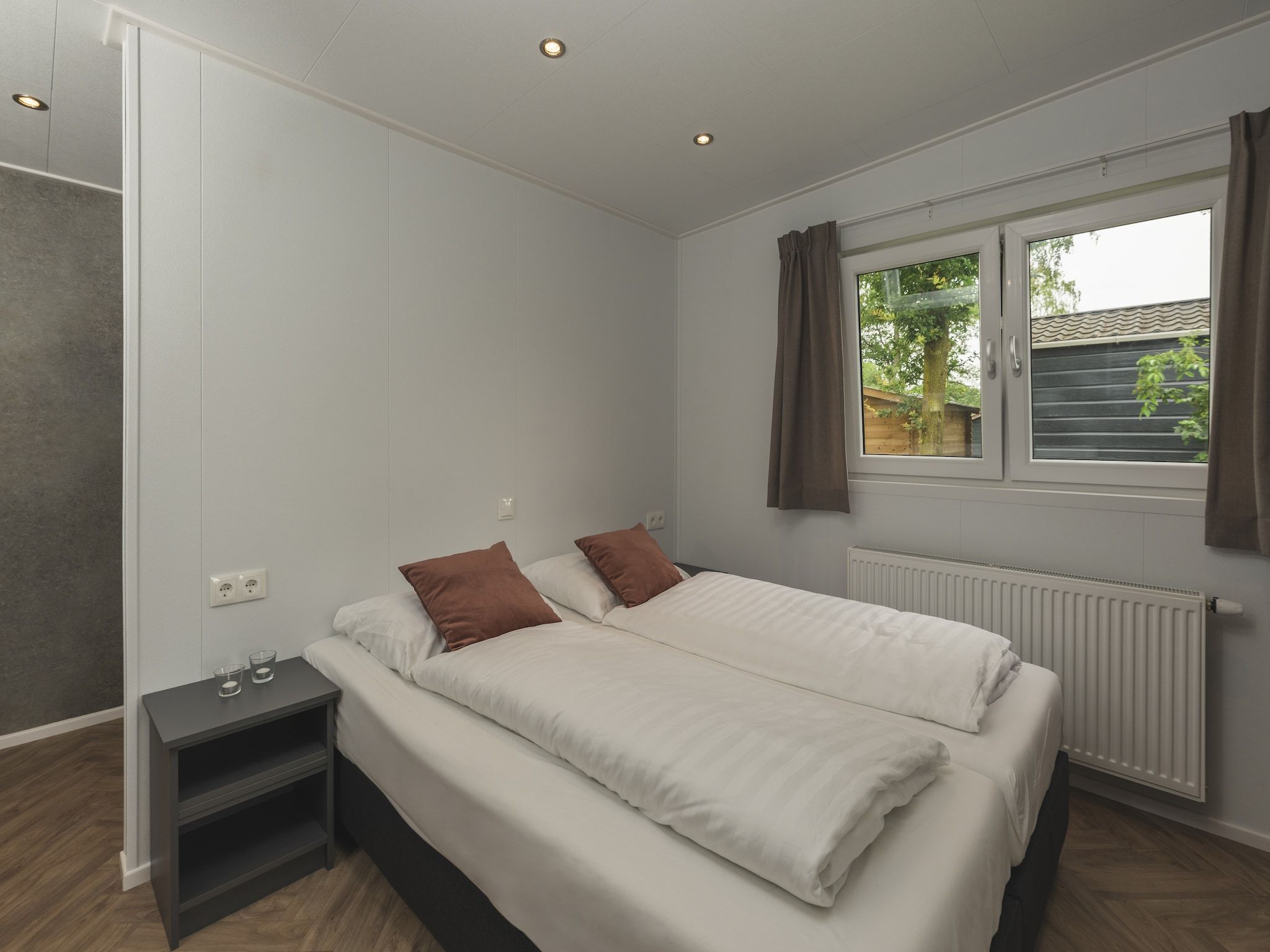 Een slaapkamer van Vakantiepark Mölke 28 in Zuna