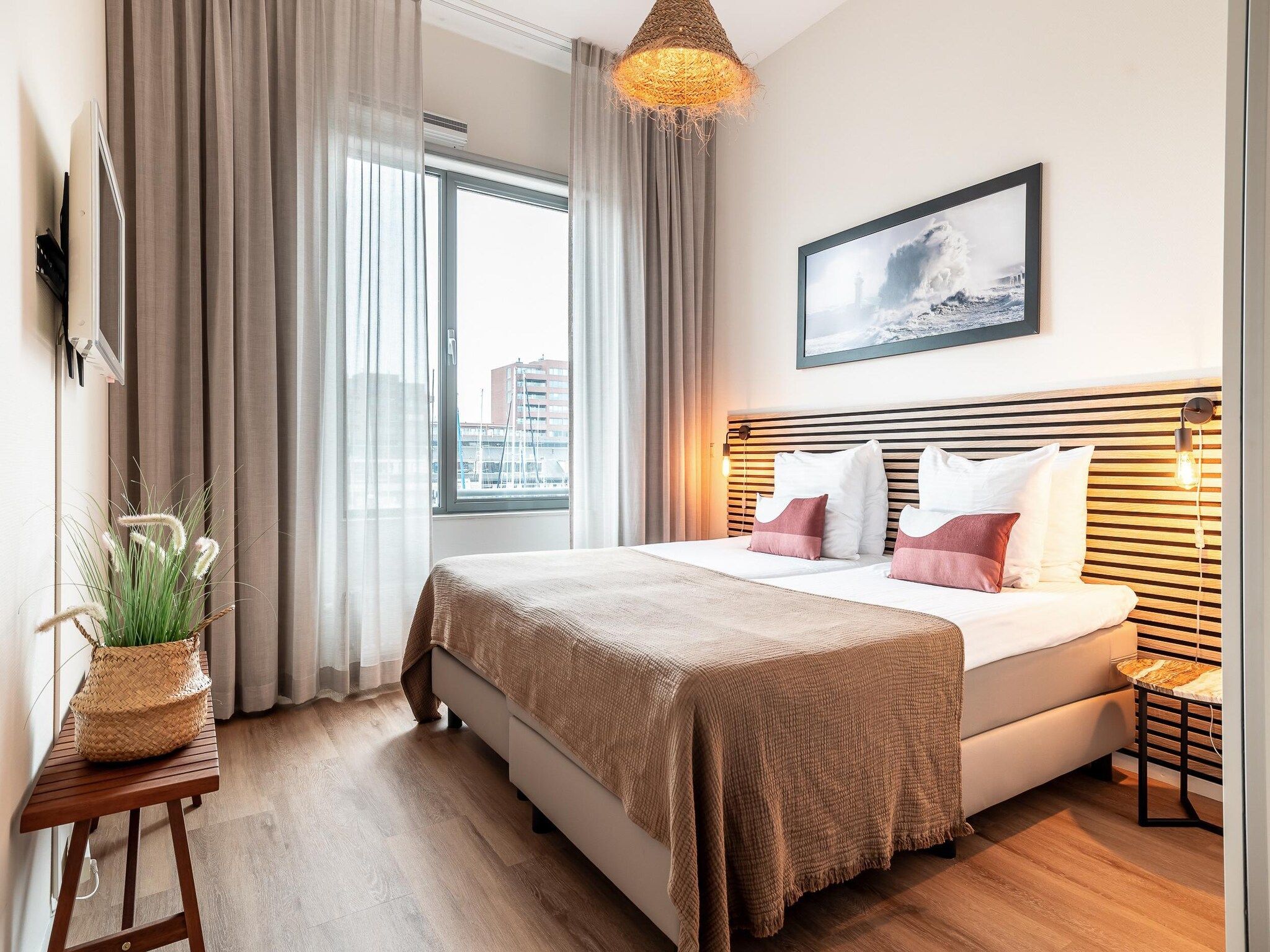 Een slaapkamer van Scheveningen Harbour 56 in Den Haag