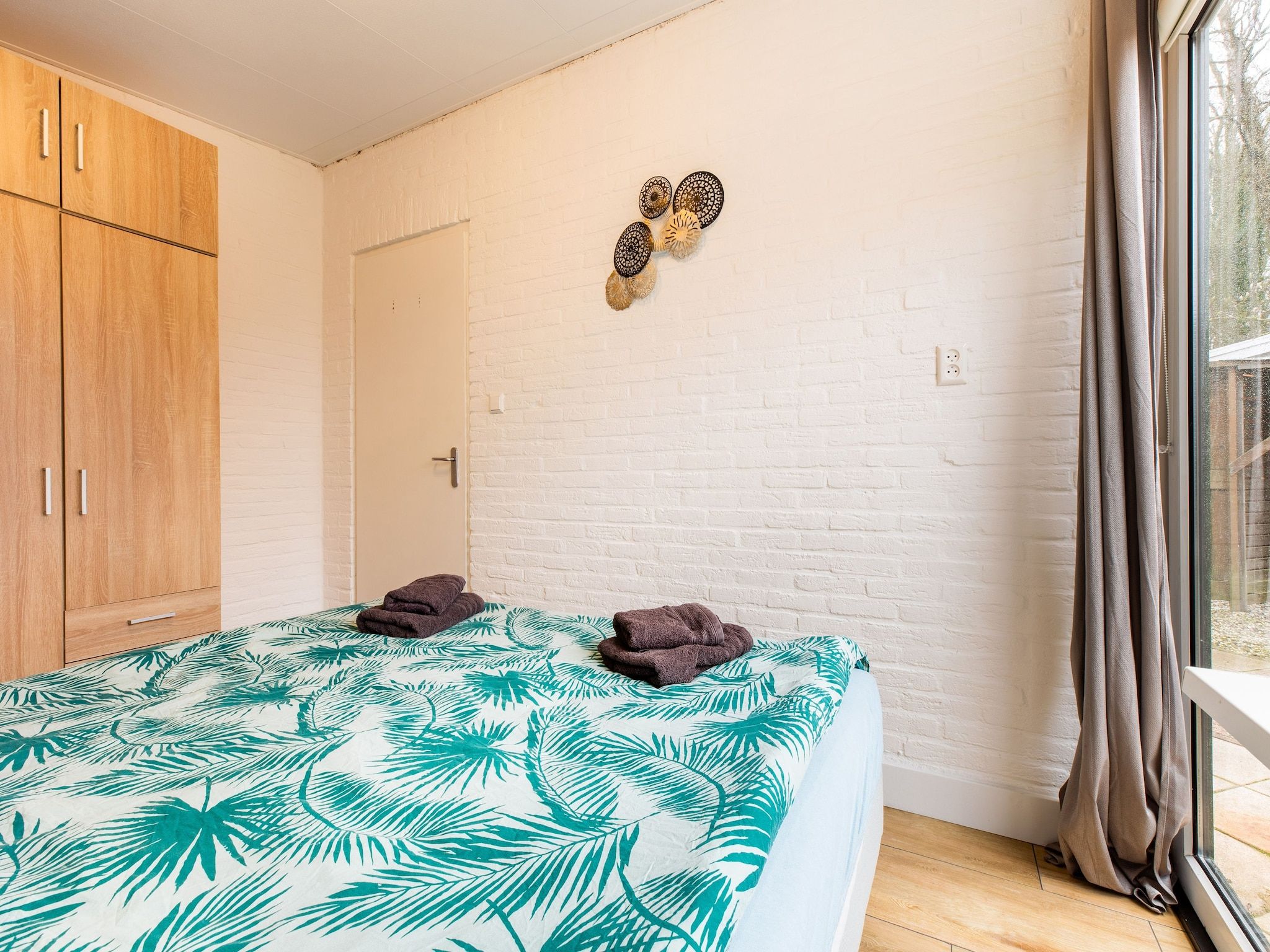 Een slaapkamer van De Tulp in Noordwijkerhout