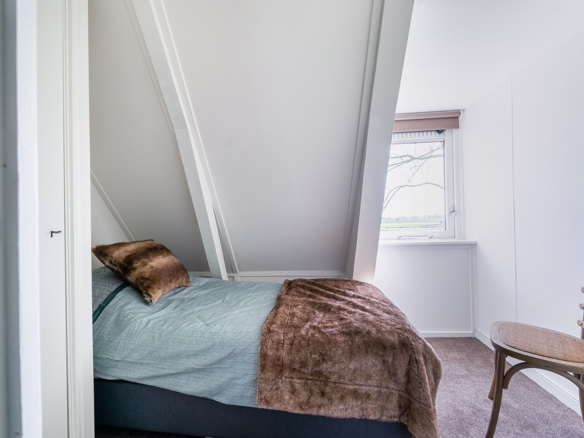 Een slaapkamer van B&B boerderij GRUTSK in Suwald