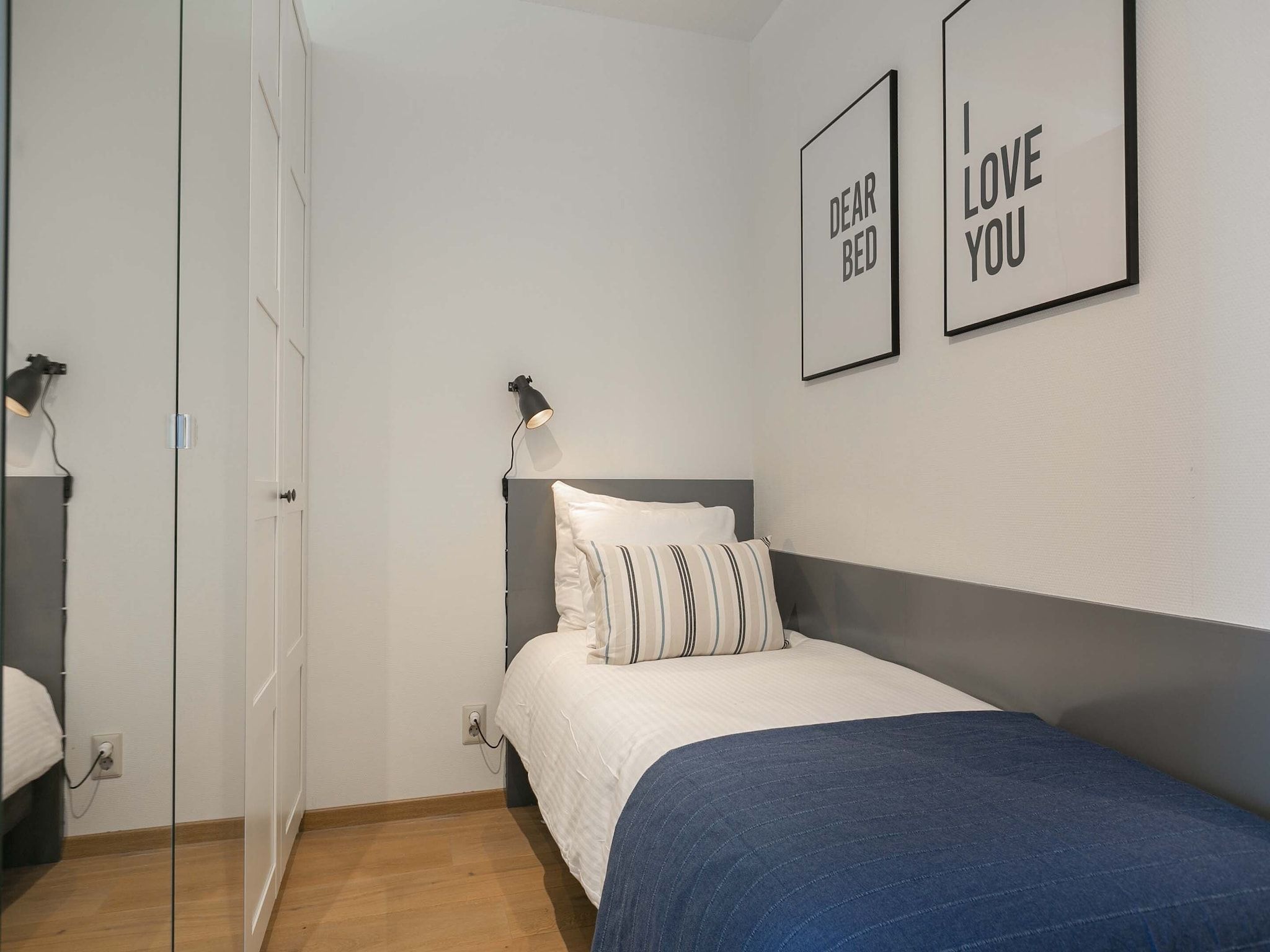 Een slaapkamer van Scheveningen Harbour 28 in Den Haag