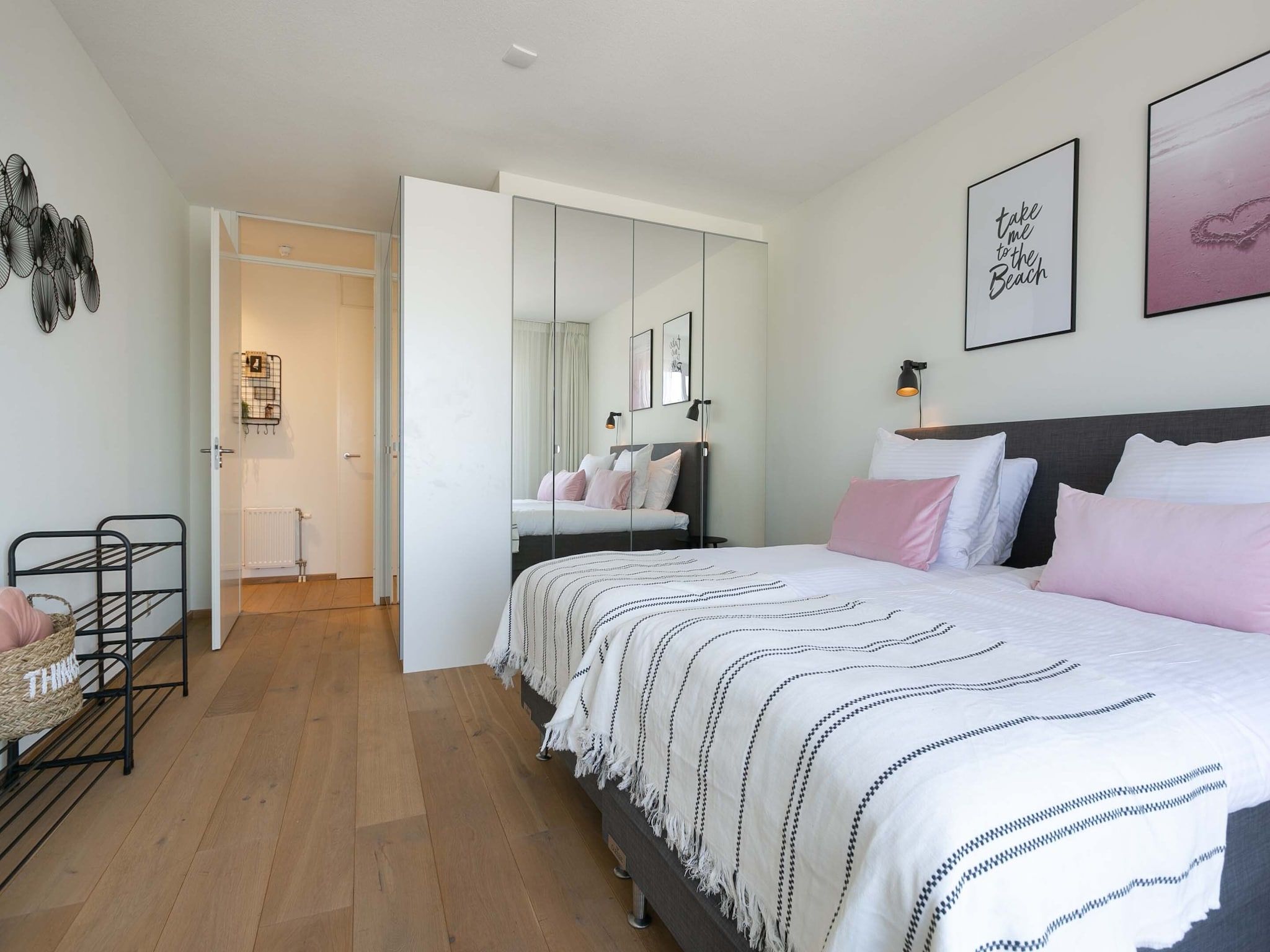 Een slaapkamer van Scheveningen Harbour 28 in Den Haag