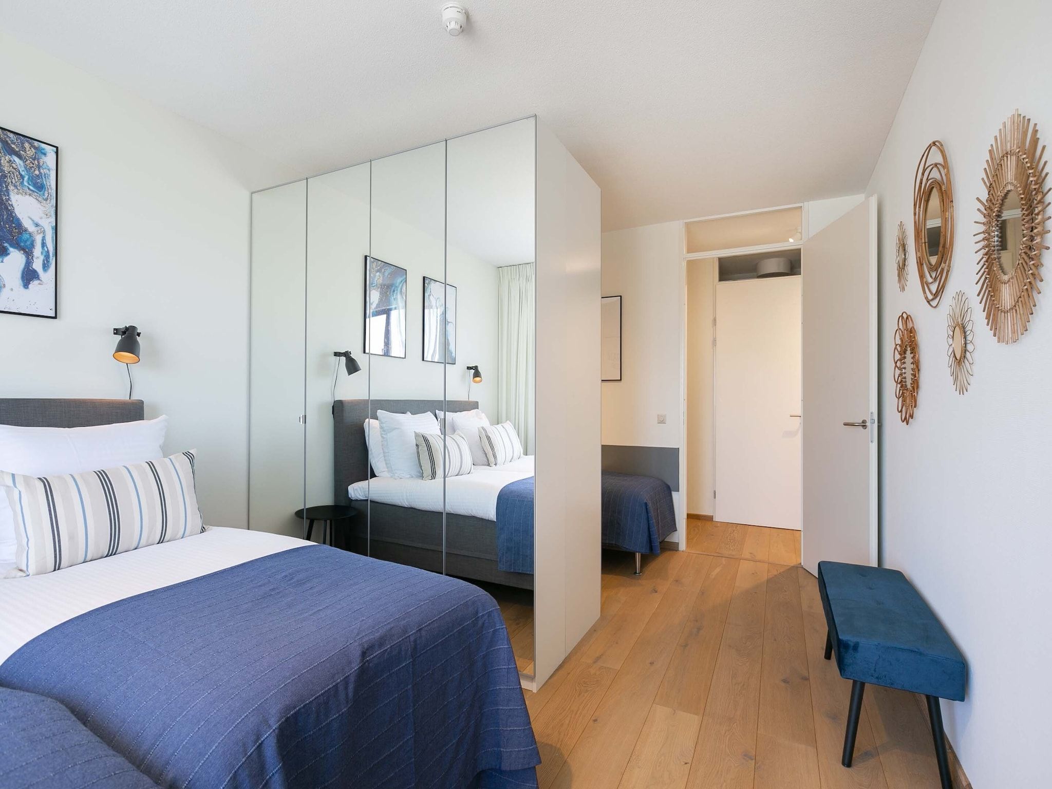 Een slaapkamer van Scheveningen Harbour 28 in Den Haag