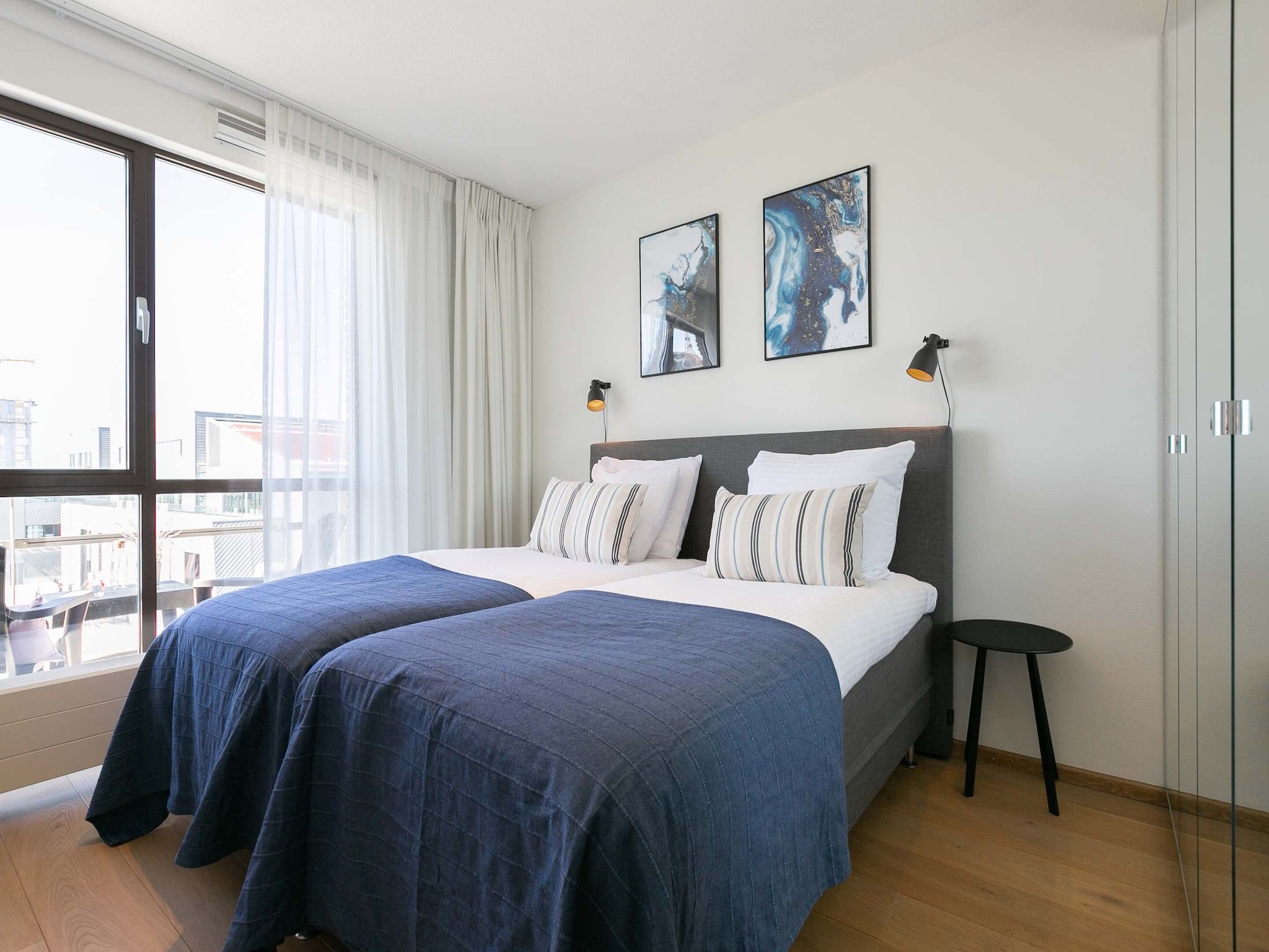 Een slaapkamer van Scheveningen Harbour 28 in Den Haag