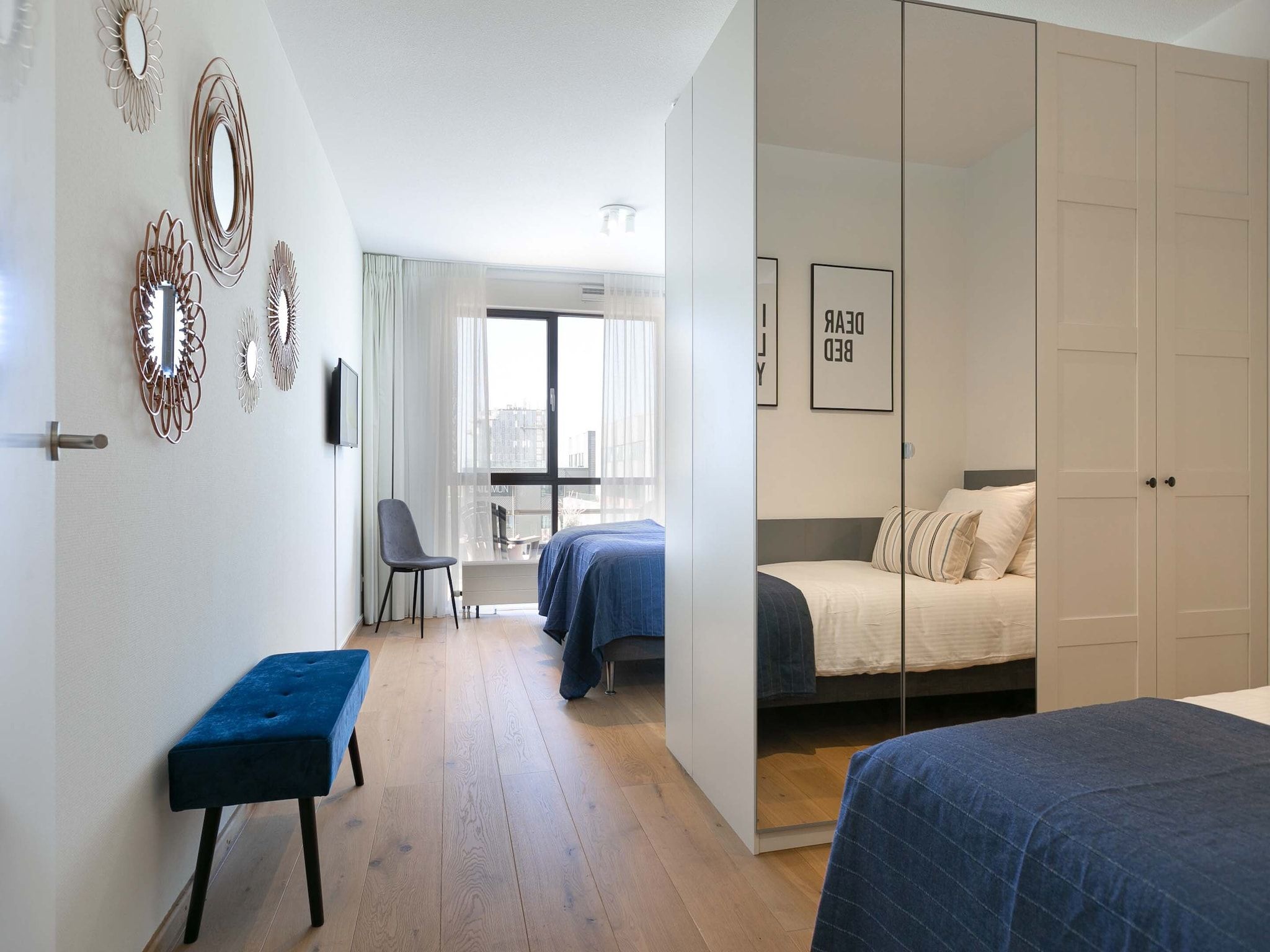Een slaapkamer van Scheveningen Harbour 28 in Den Haag