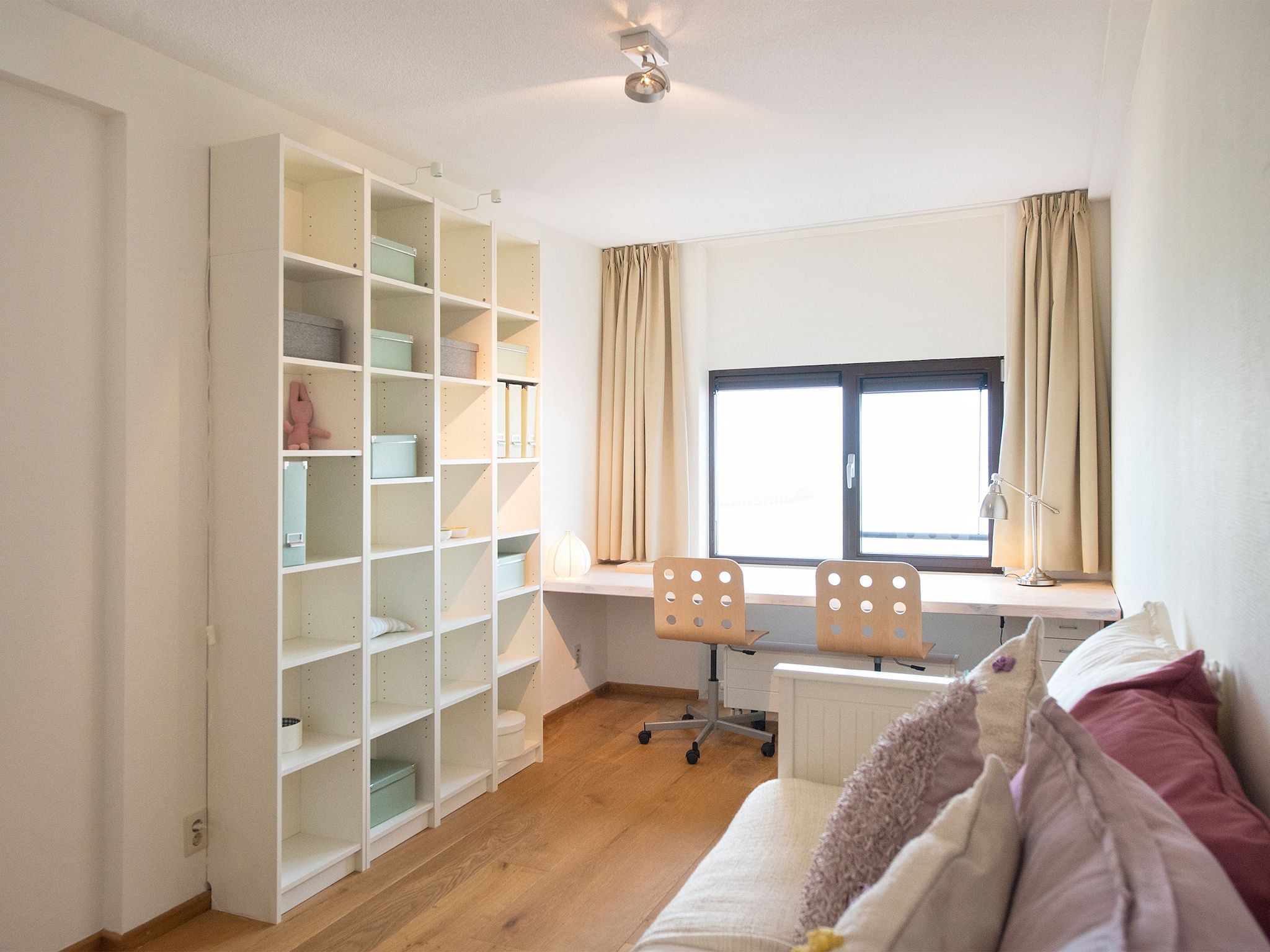 Een slaapkamer van Scheveningen Harbour 32C in Den Haag