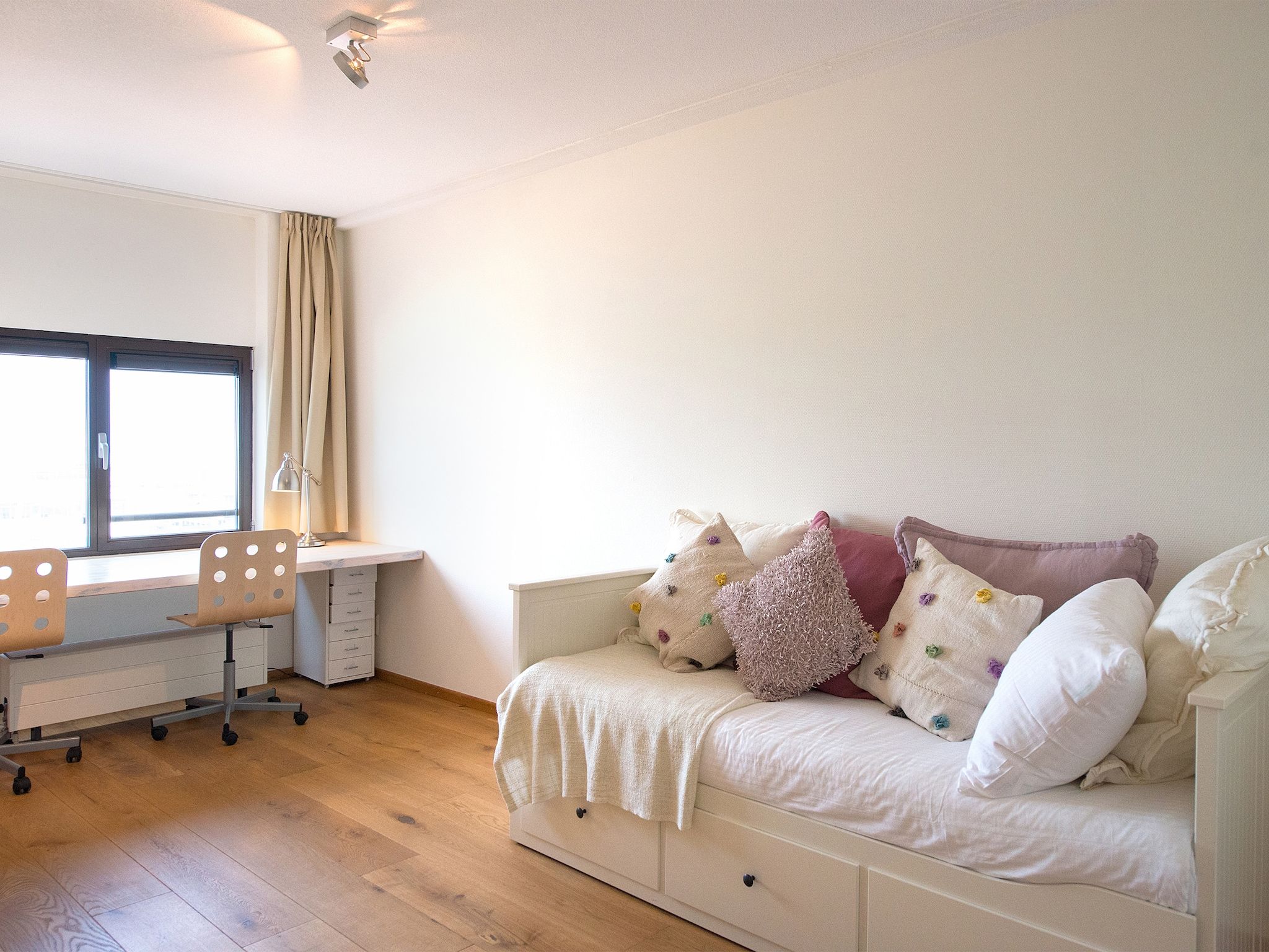 Een slaapkamer van Scheveningen Harbour 32C in Den Haag