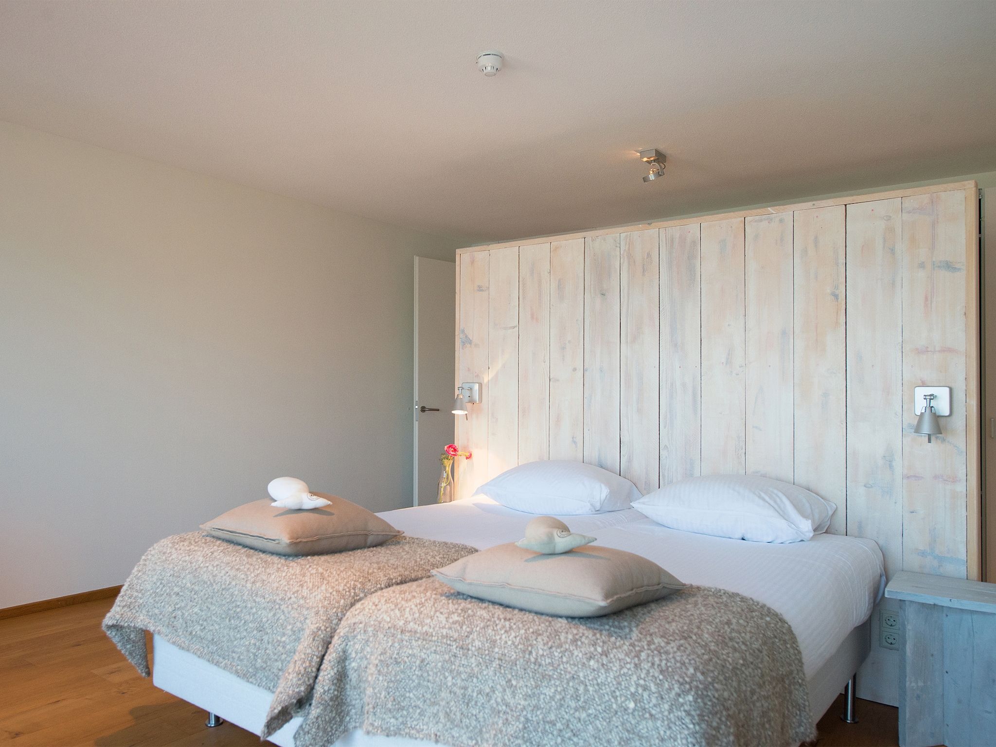 Een slaapkamer van Scheveningen Harbour 32C in Den Haag
