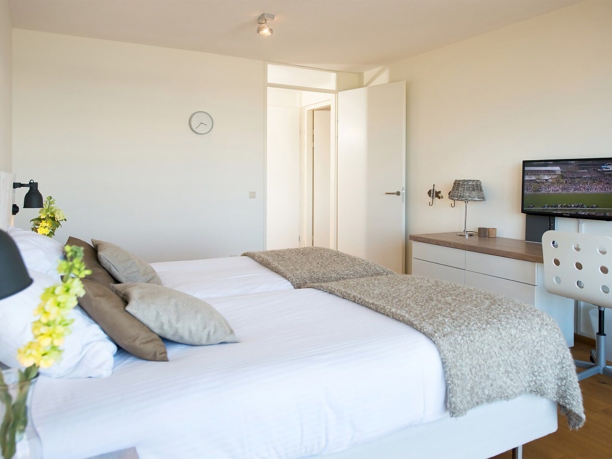 Een slaapkamer van Scheveningen Harbour 36 in Den Haag