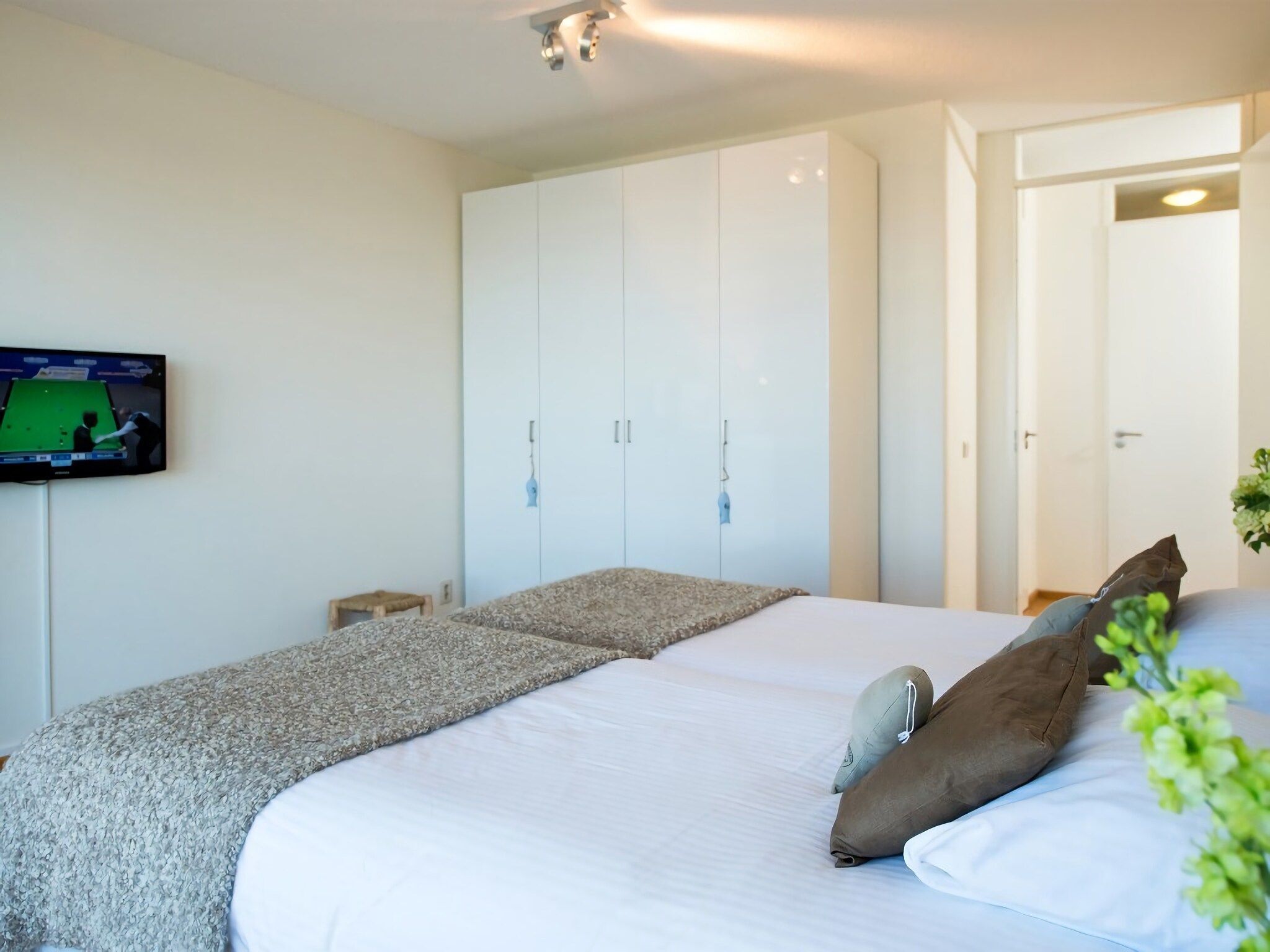 Een slaapkamer van Scheveningen Harbour 36 in Den Haag