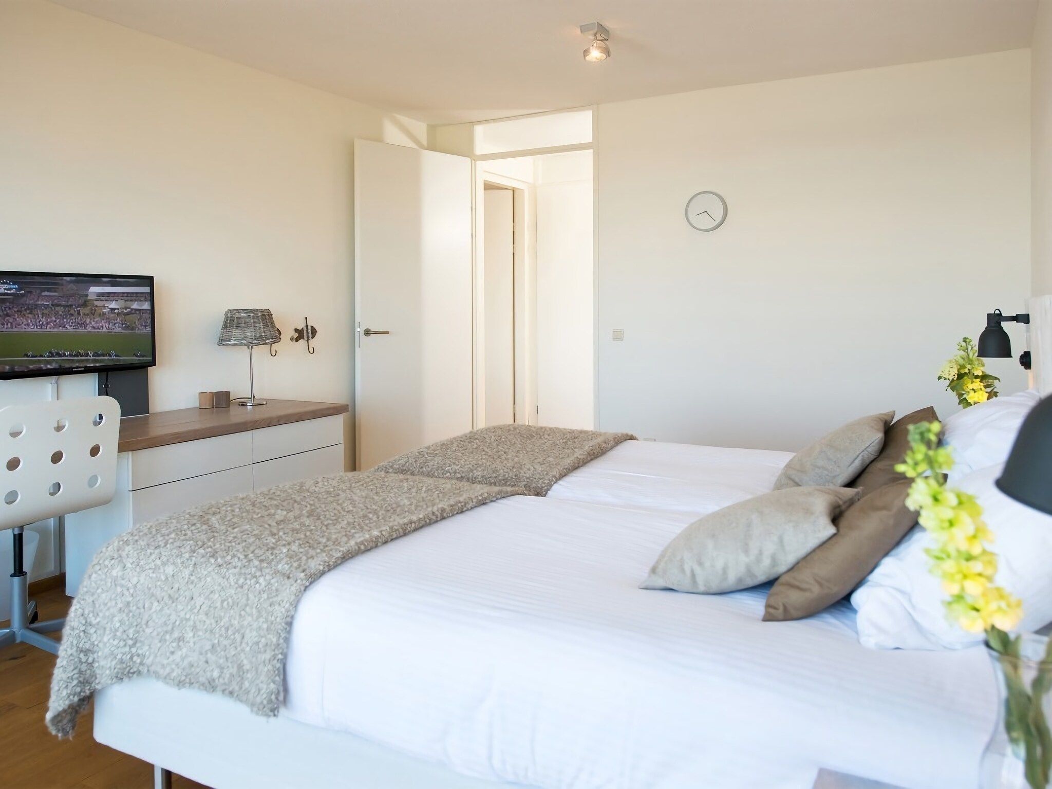 Een slaapkamer van Scheveningen Harbour 36 in Den Haag