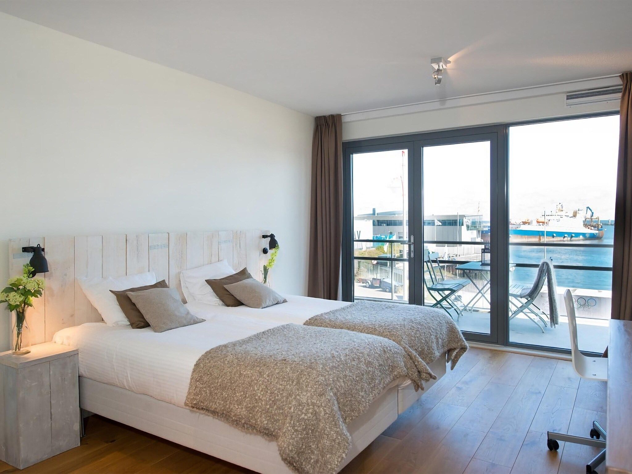 Een slaapkamer van Scheveningen Harbour 36 in Den Haag