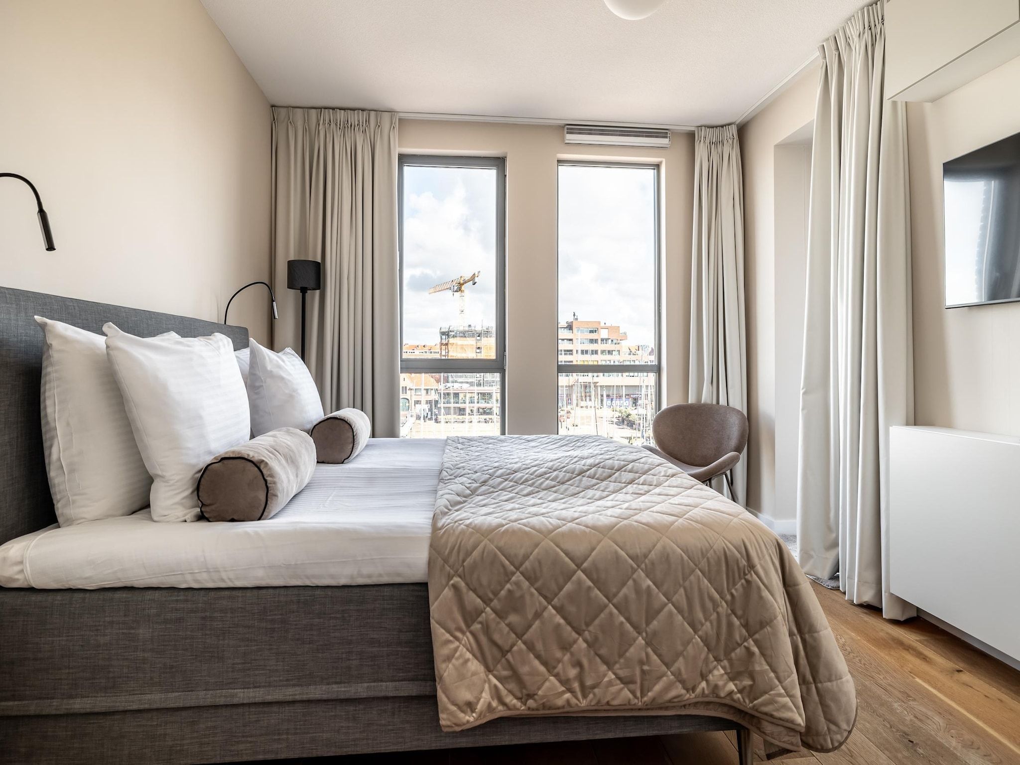 Een slaapkamer van Scheveningen Harbour 38C in Den Haag