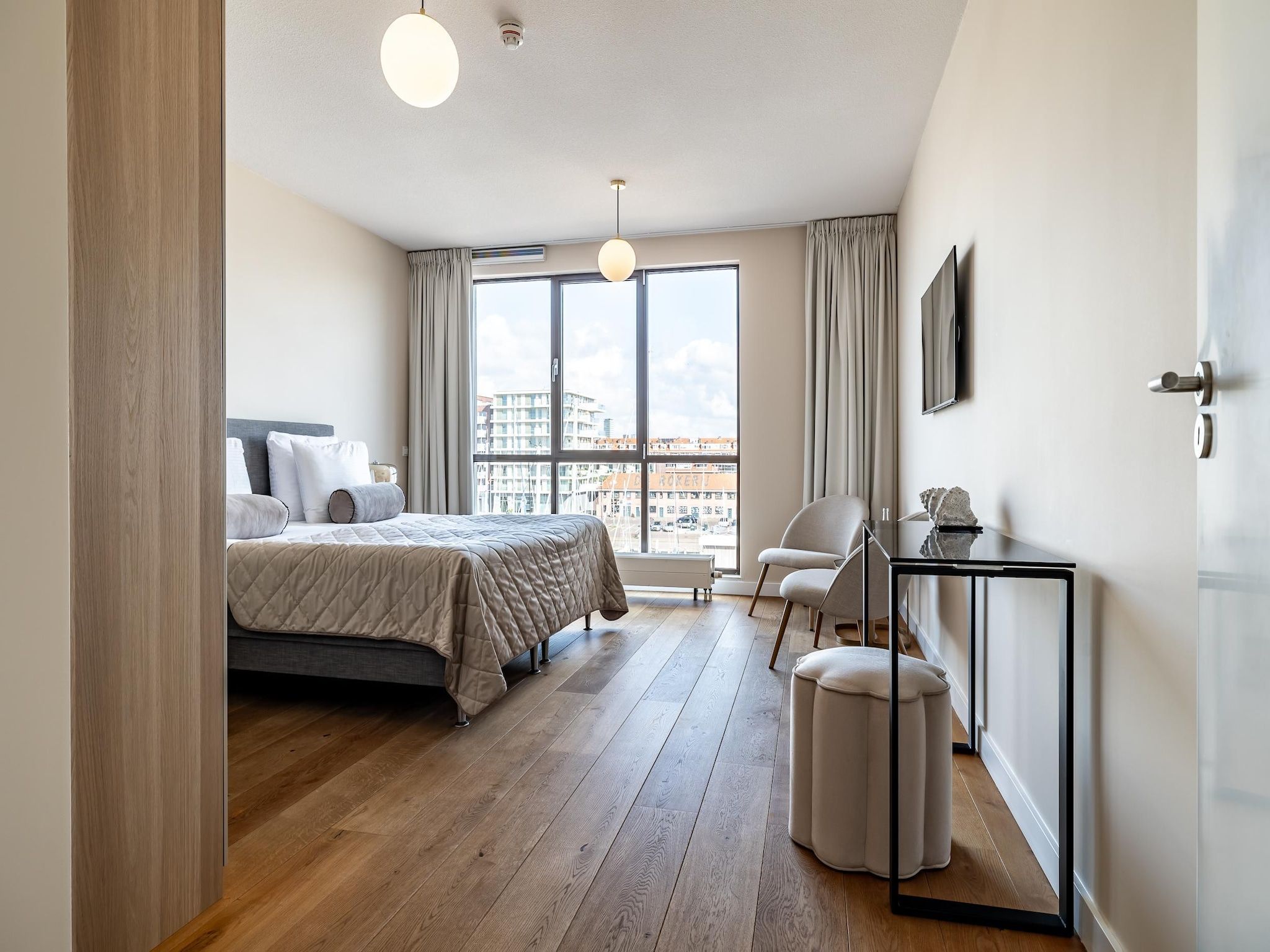 Een slaapkamer van Scheveningen Harbour 38C in Den Haag