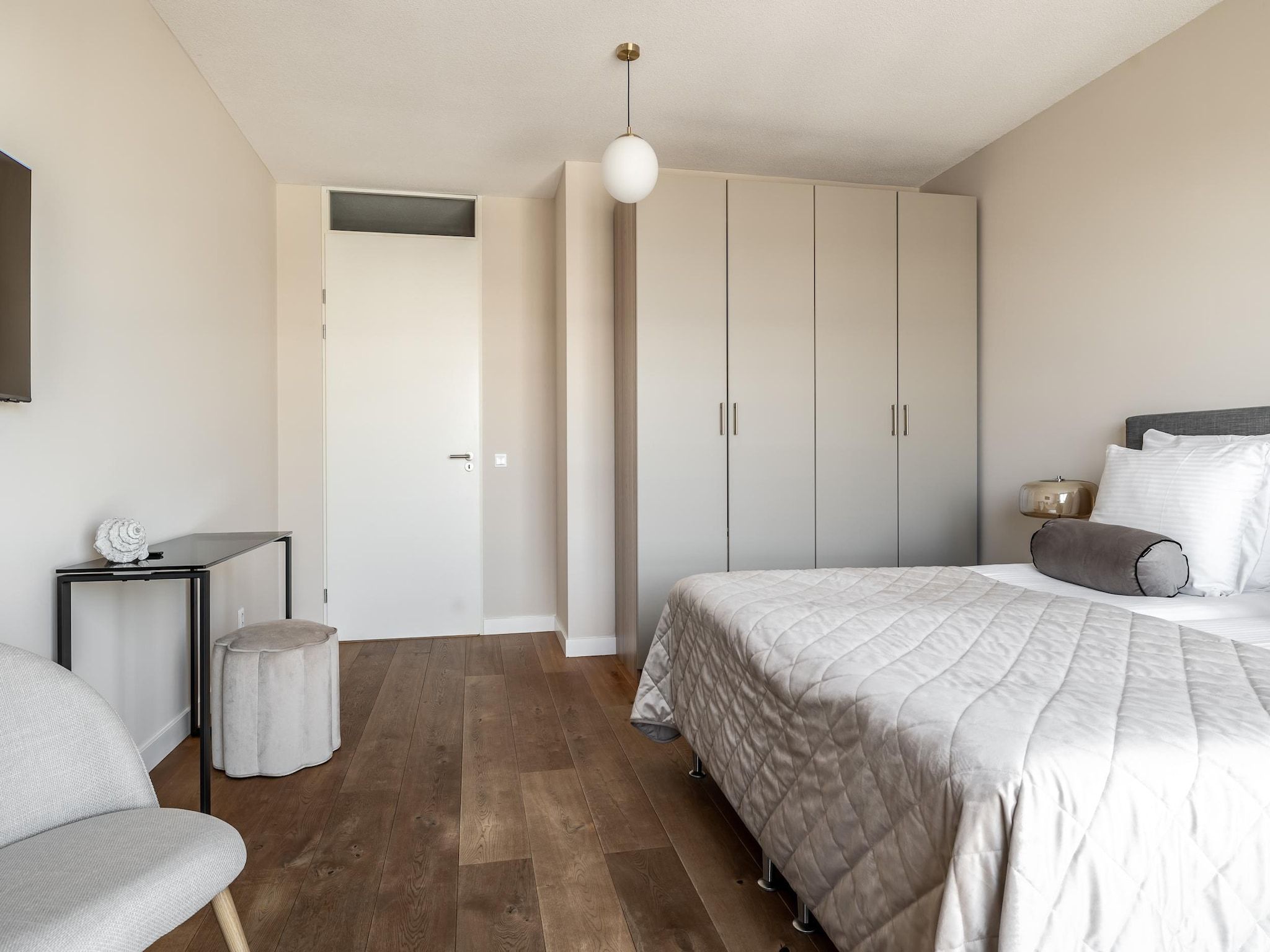Een slaapkamer van Scheveningen Harbour 38C in Den Haag