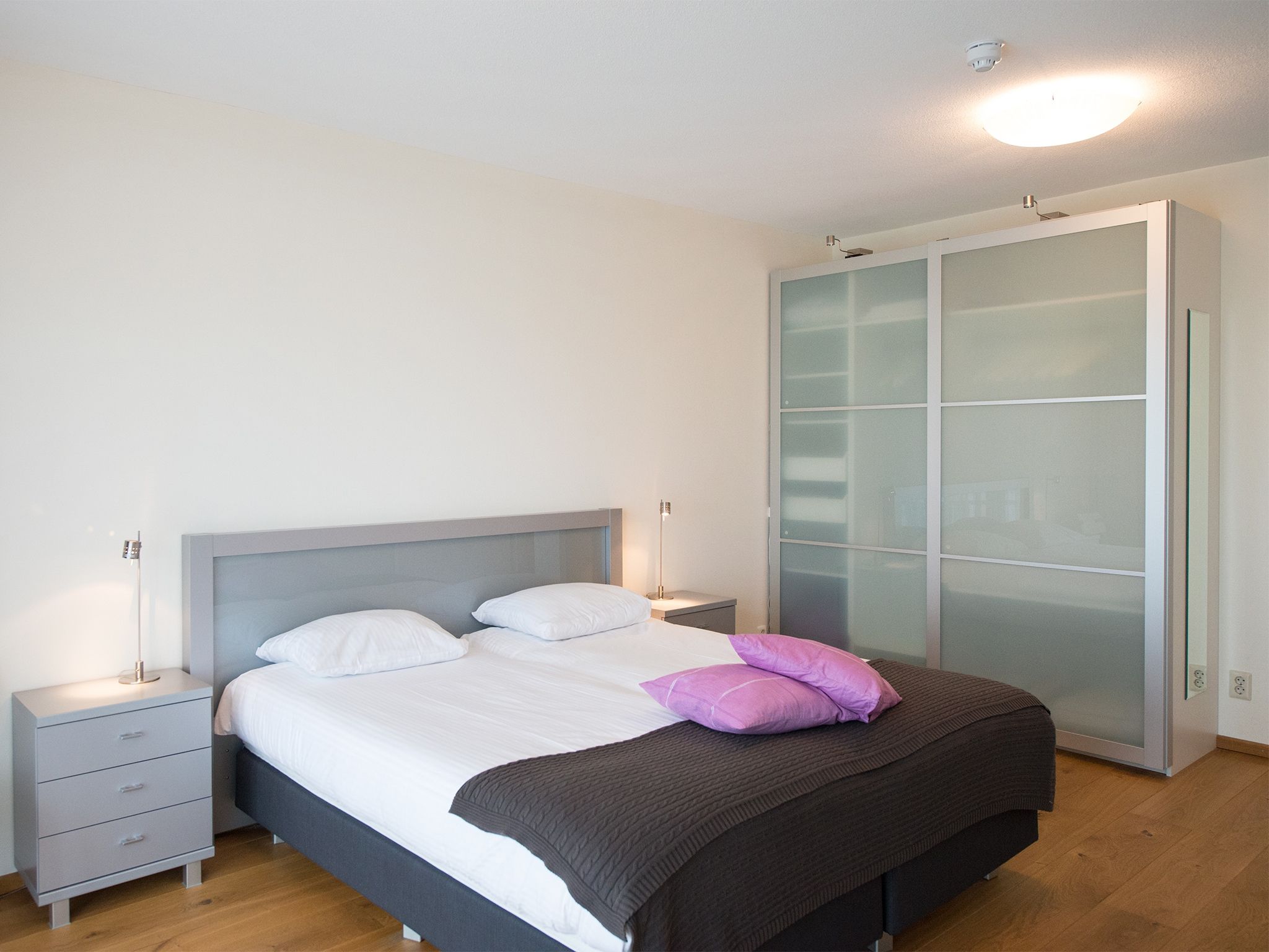 Een slaapkamer van Scheveningen Harbour 40 in Den Haag