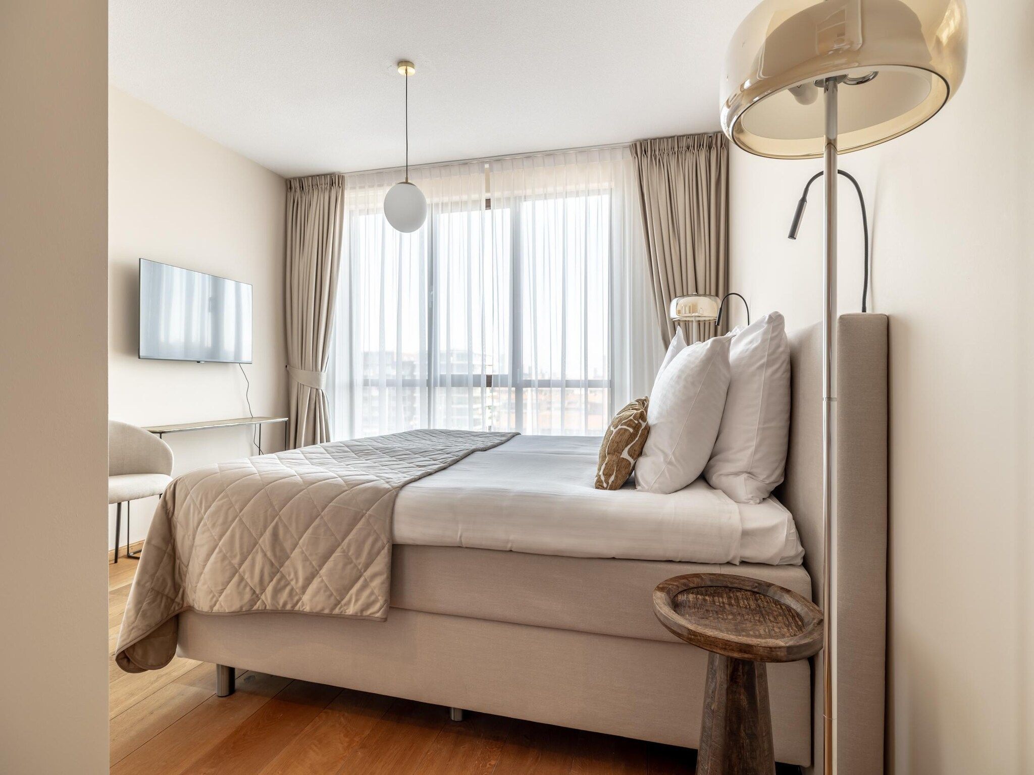 Een slaapkamer van Scheveningen Harbour 42A in Den Haag