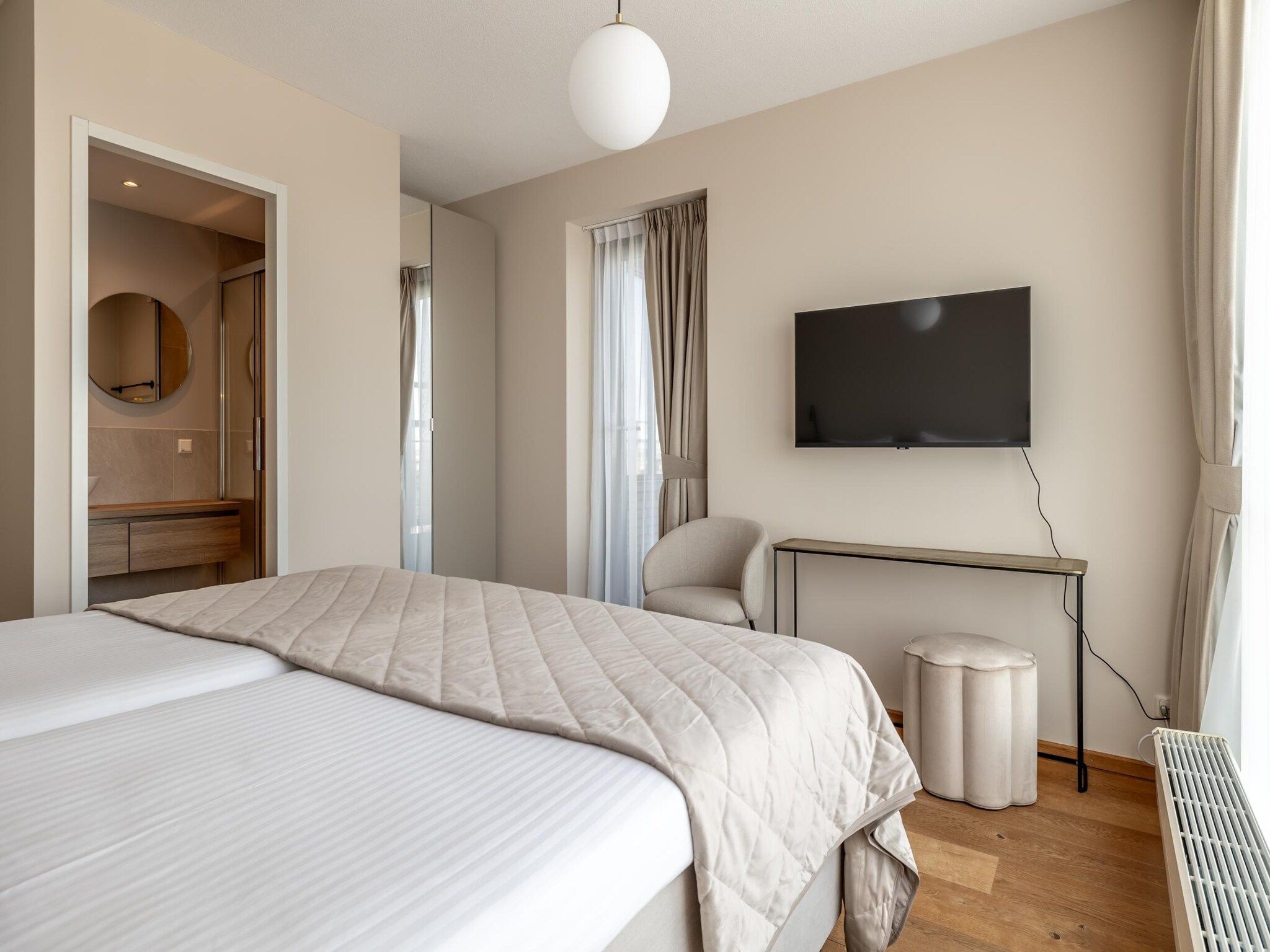 Een slaapkamer van Scheveningen Harbour 42A in Den Haag