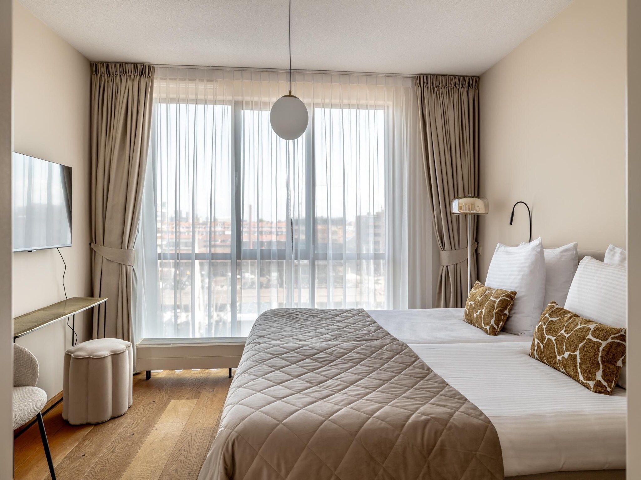 Een slaapkamer van Scheveningen Harbour 42A in Den Haag