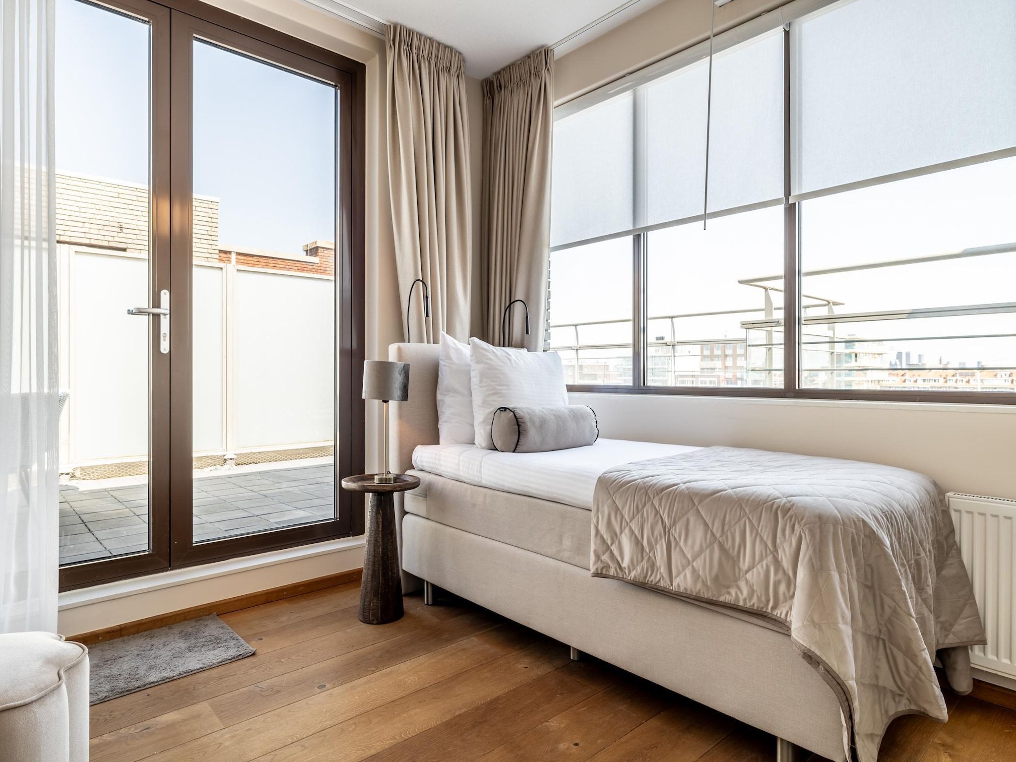 Een slaapkamer van Scheveningen Harbour 42A in Den Haag