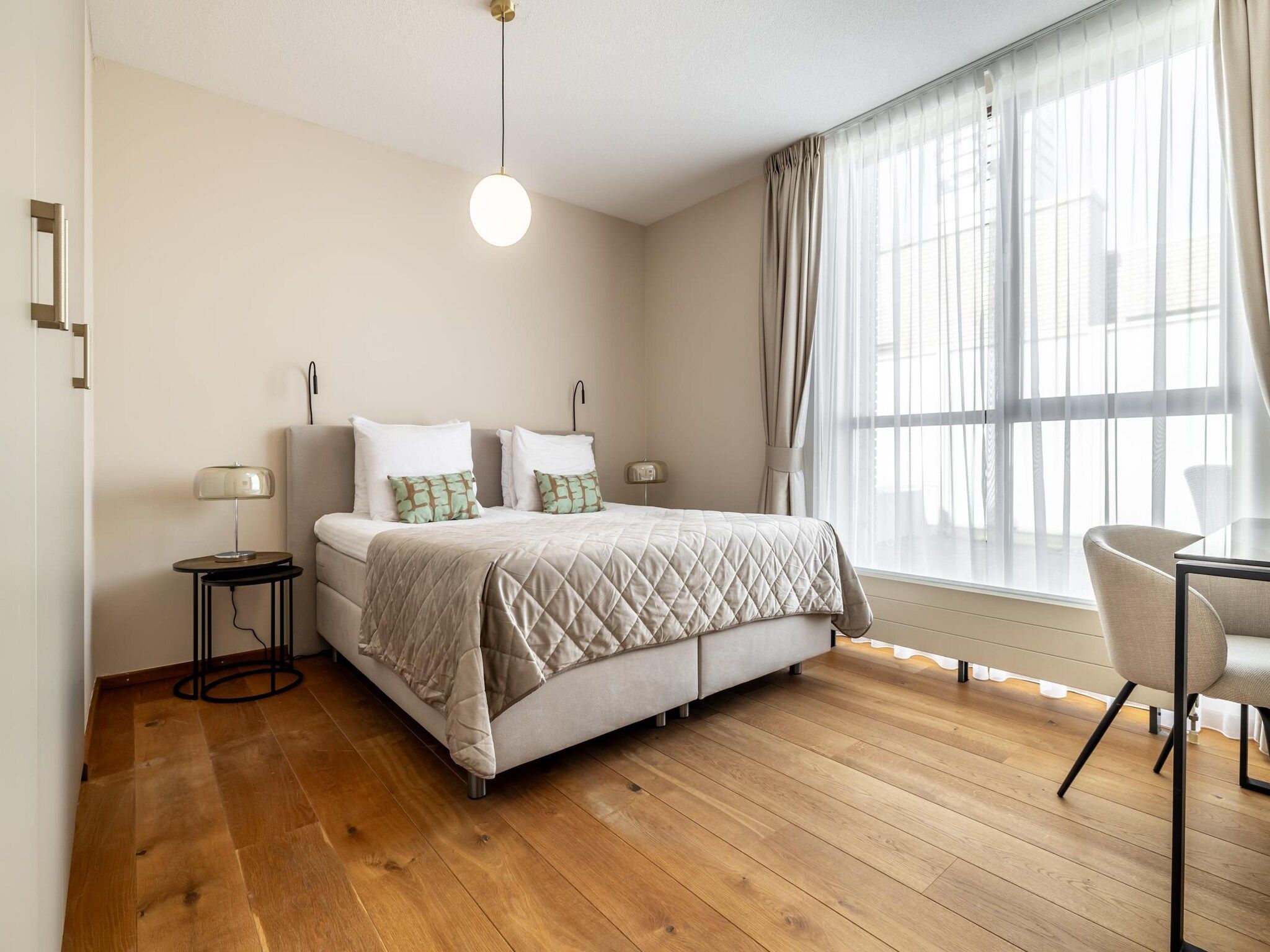 Een slaapkamer van Scheveningen Harbour 42A in Den Haag