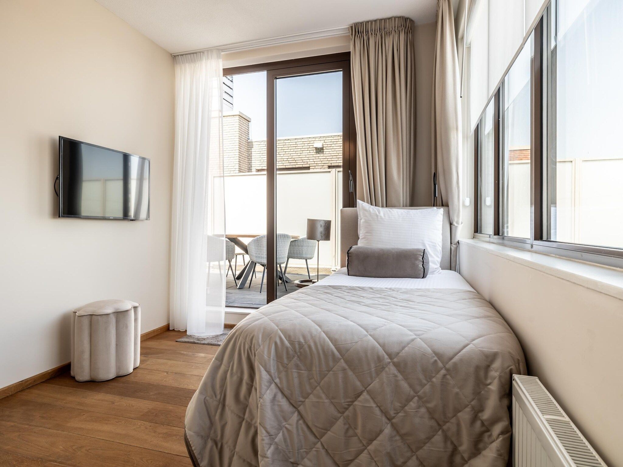 Een slaapkamer van Scheveningen Harbour 42A in Den Haag