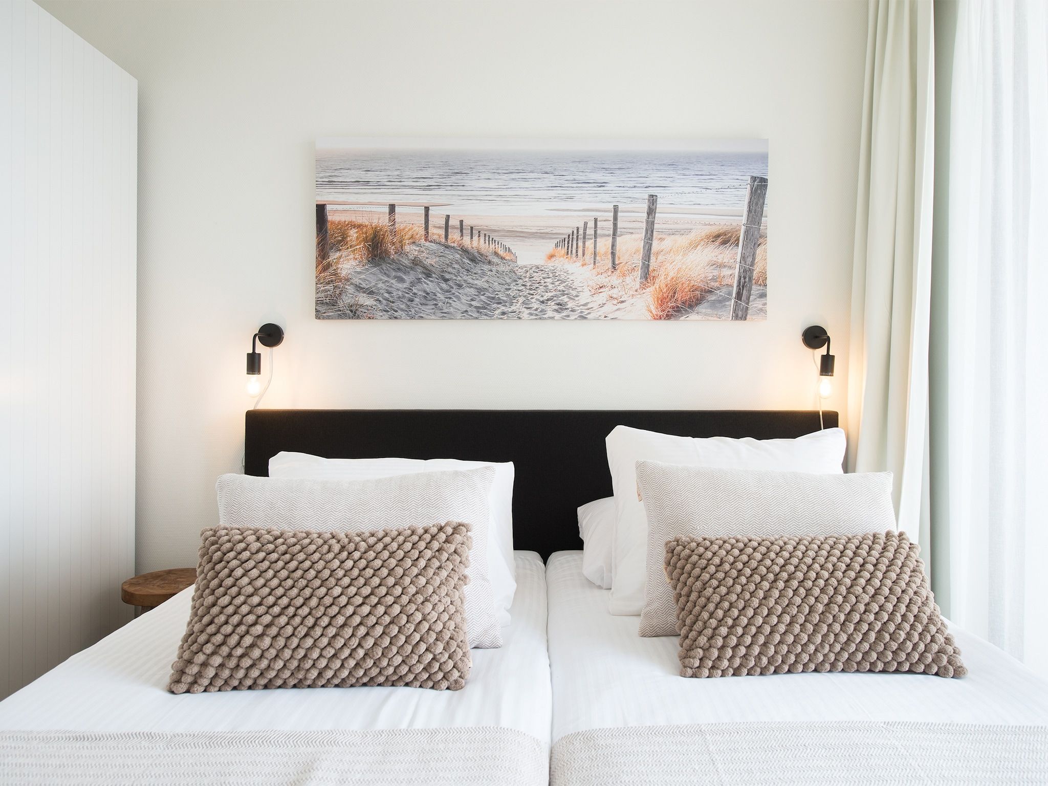 Een slaapkamer van Scheveningen Harbour 48A in Den Haag