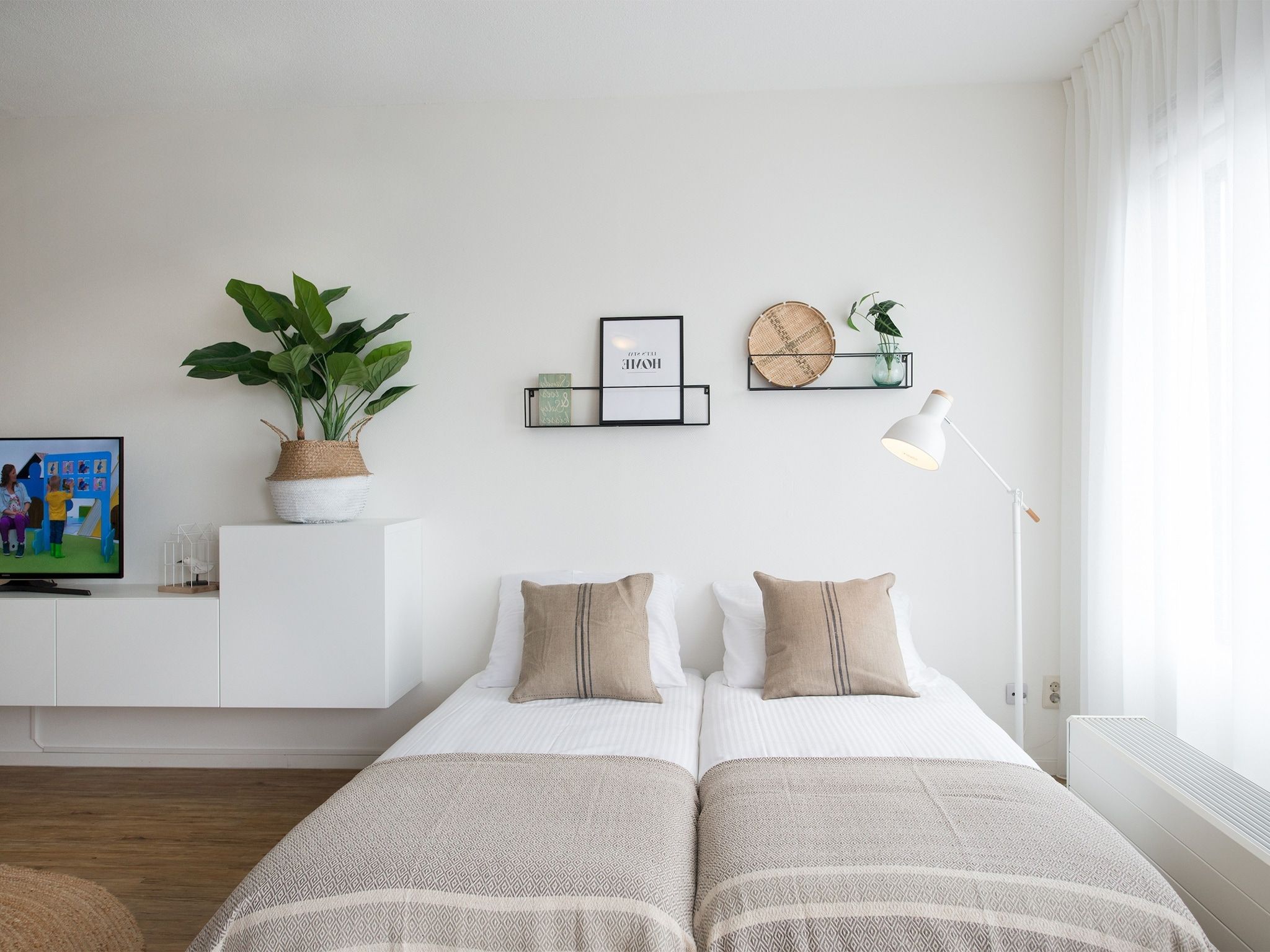 Een slaapkamer van Scheveningen Harbour 48A in Den Haag
