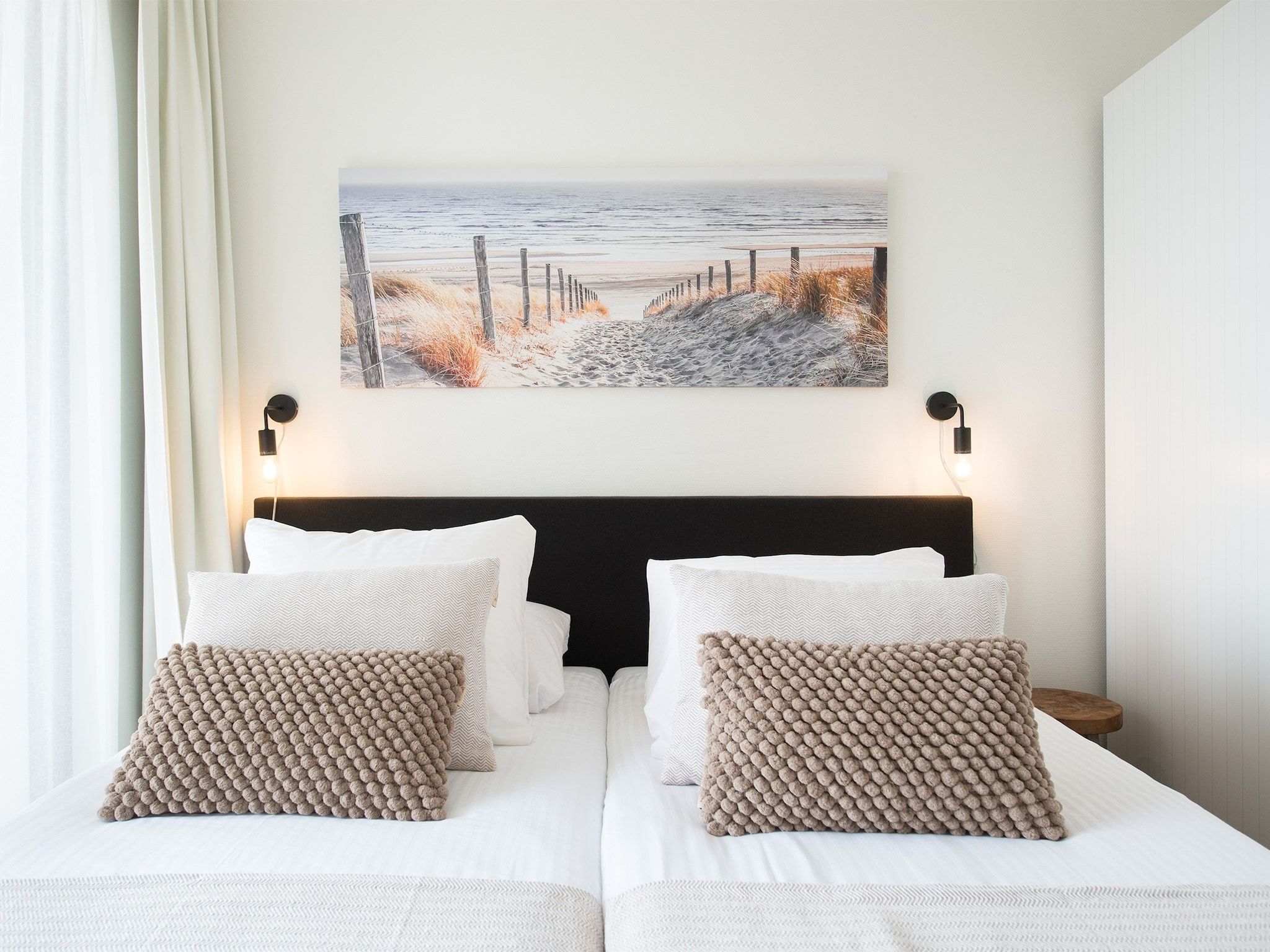 Een slaapkamer van Scheveningen Harbour 48A in Den Haag